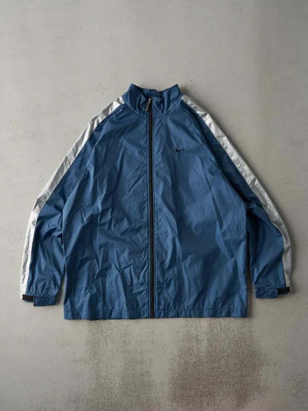 Vintage Y2K Slate Blue and Reflective Silver Nike Swoosh Windbreaker Jacket (L) sold by Rebalance Vintage