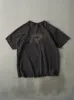 Vintage 90s Faded Black Guess Logo Tee (M/L) sold by Rebalance Vintage