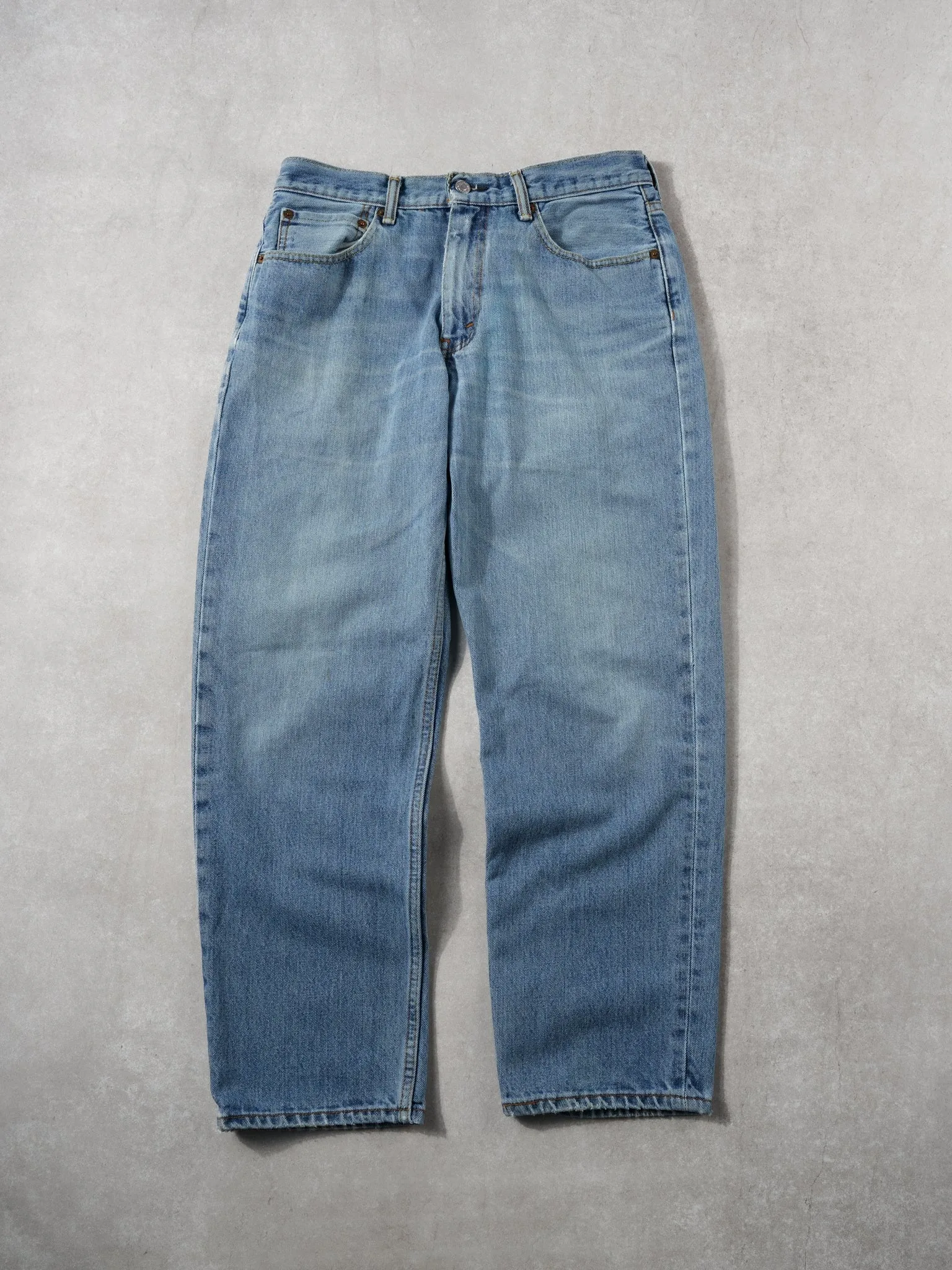 Vintage Y2k Light Blue Levi's 550 Denim Jeans (30x30) sold by Rebalance Vintage