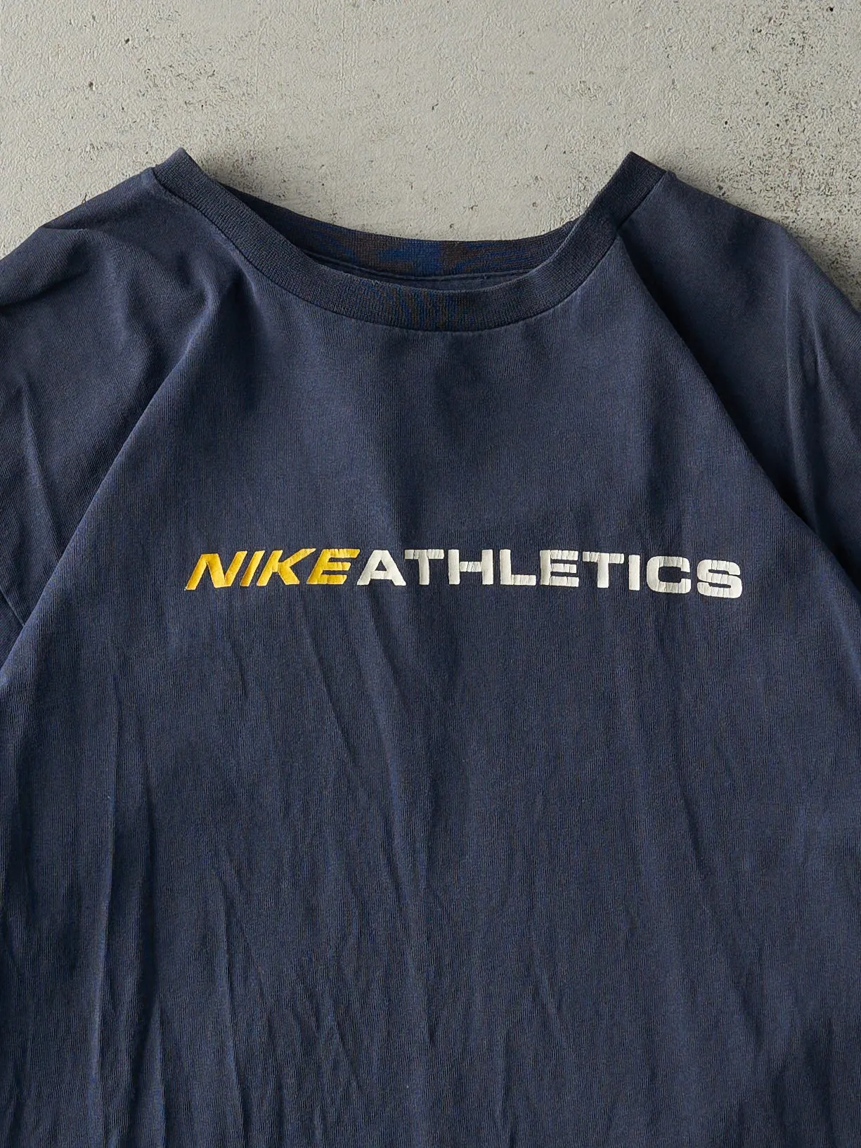 Vintage Y2K Navy Blue Nike Athletics Tee (M) sold by Rebalance Vintage product image thumbnail 2
