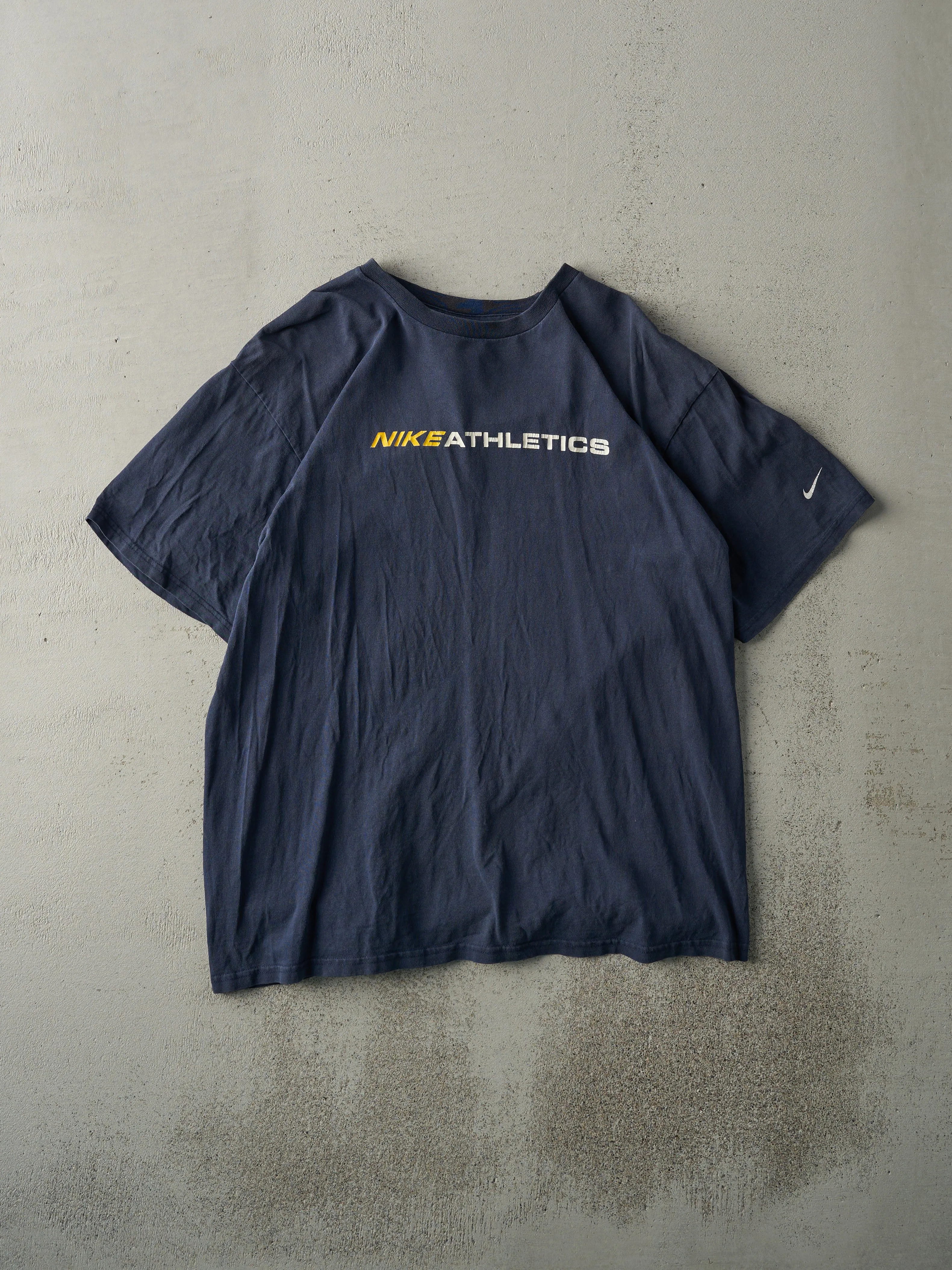 Vintage Y2K Navy Blue Nike Athletics Tee (M) sold by Rebalance Vintage