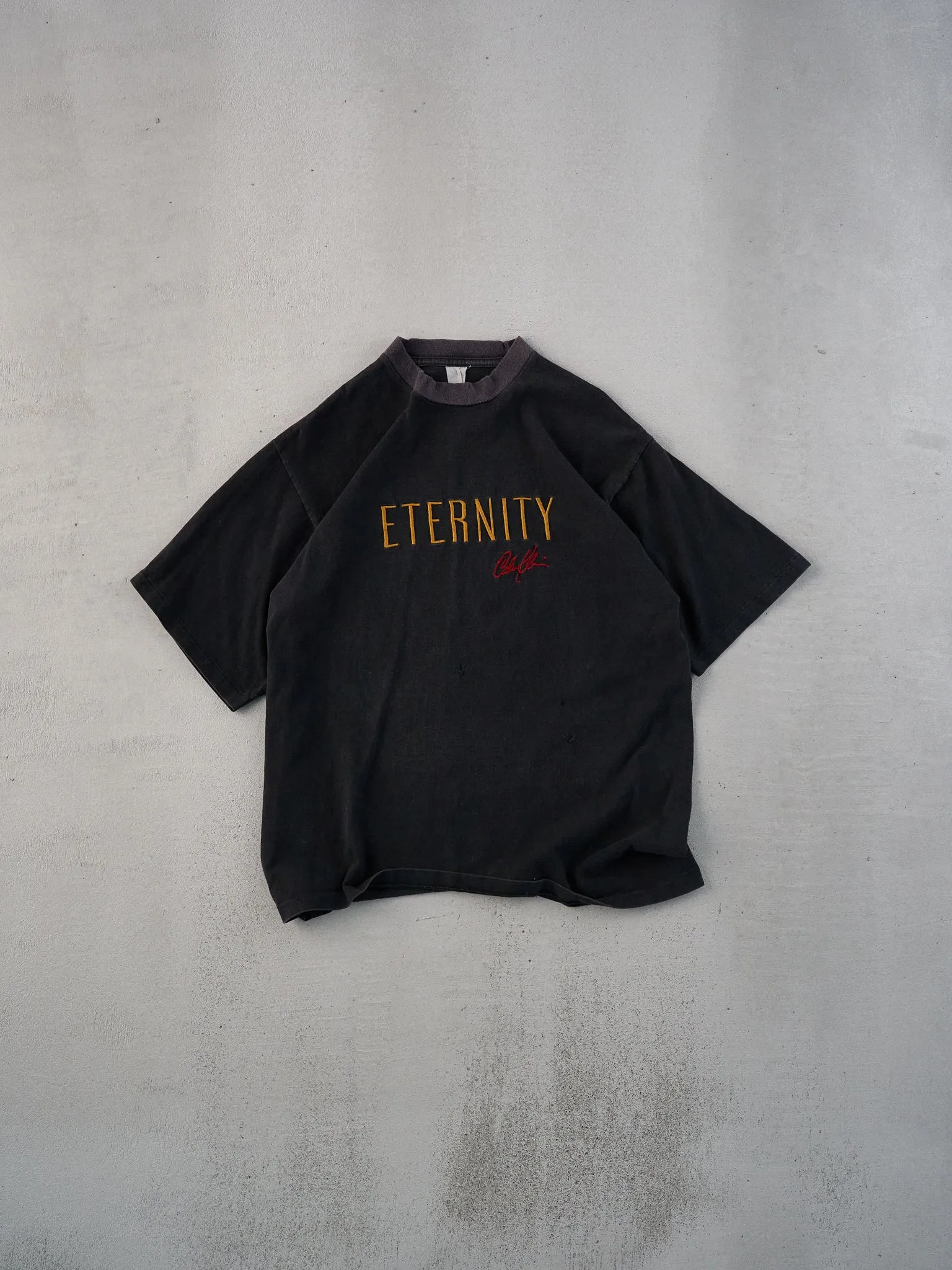 Vintage 90s Washed Black Single Stitched Eternity Embroidery Tee (M) sold by Rebalance Vintage