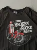 Vintage 00' Sun Faded Black The Broken Spoke Saloon Bike Rally Tee (XXL) sold by Rebalance Vintage