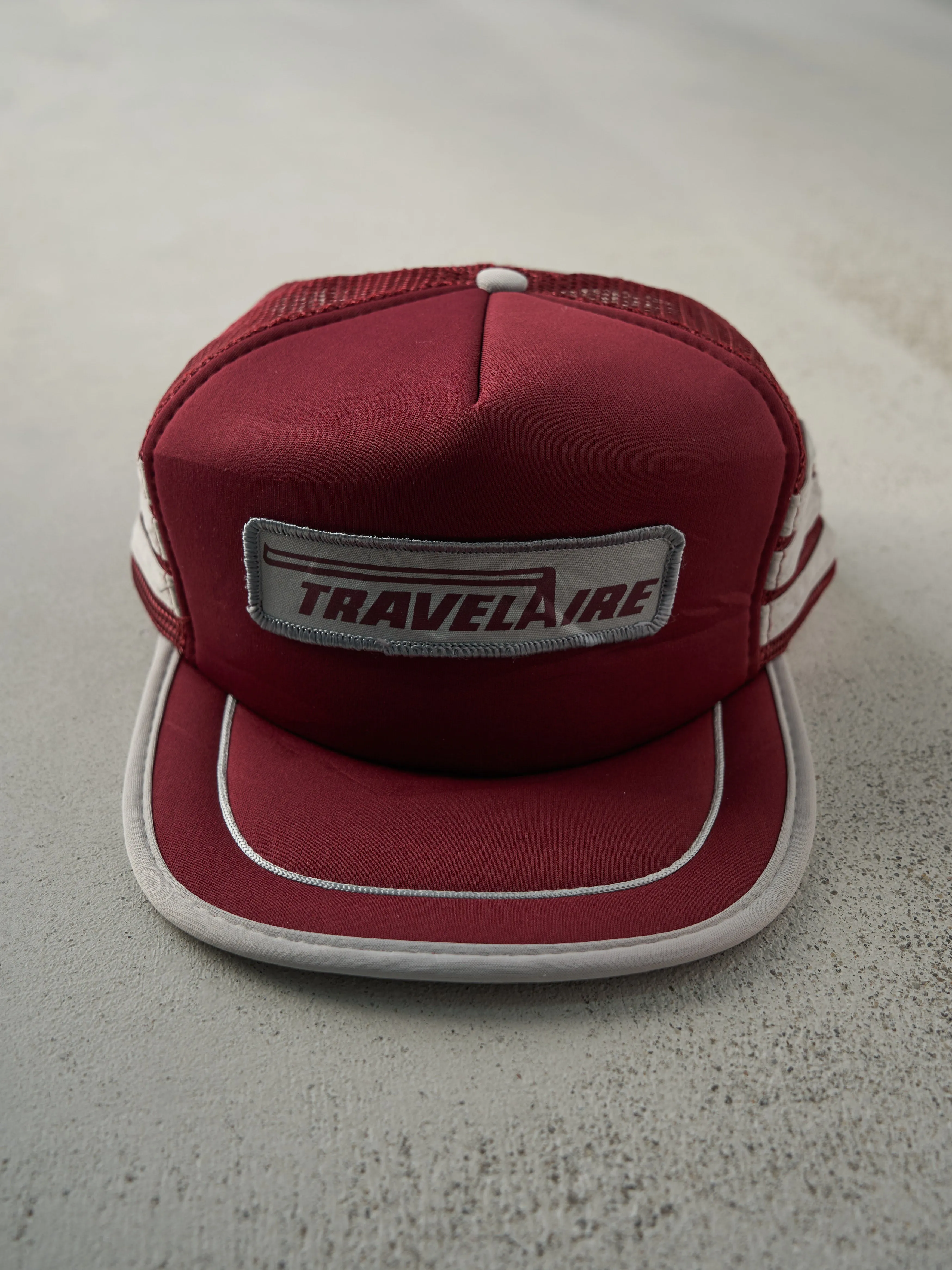 Vintage 80s Burgundy & Silver Travelaire Foam Trucker Hat sold by Rebalance Vintage