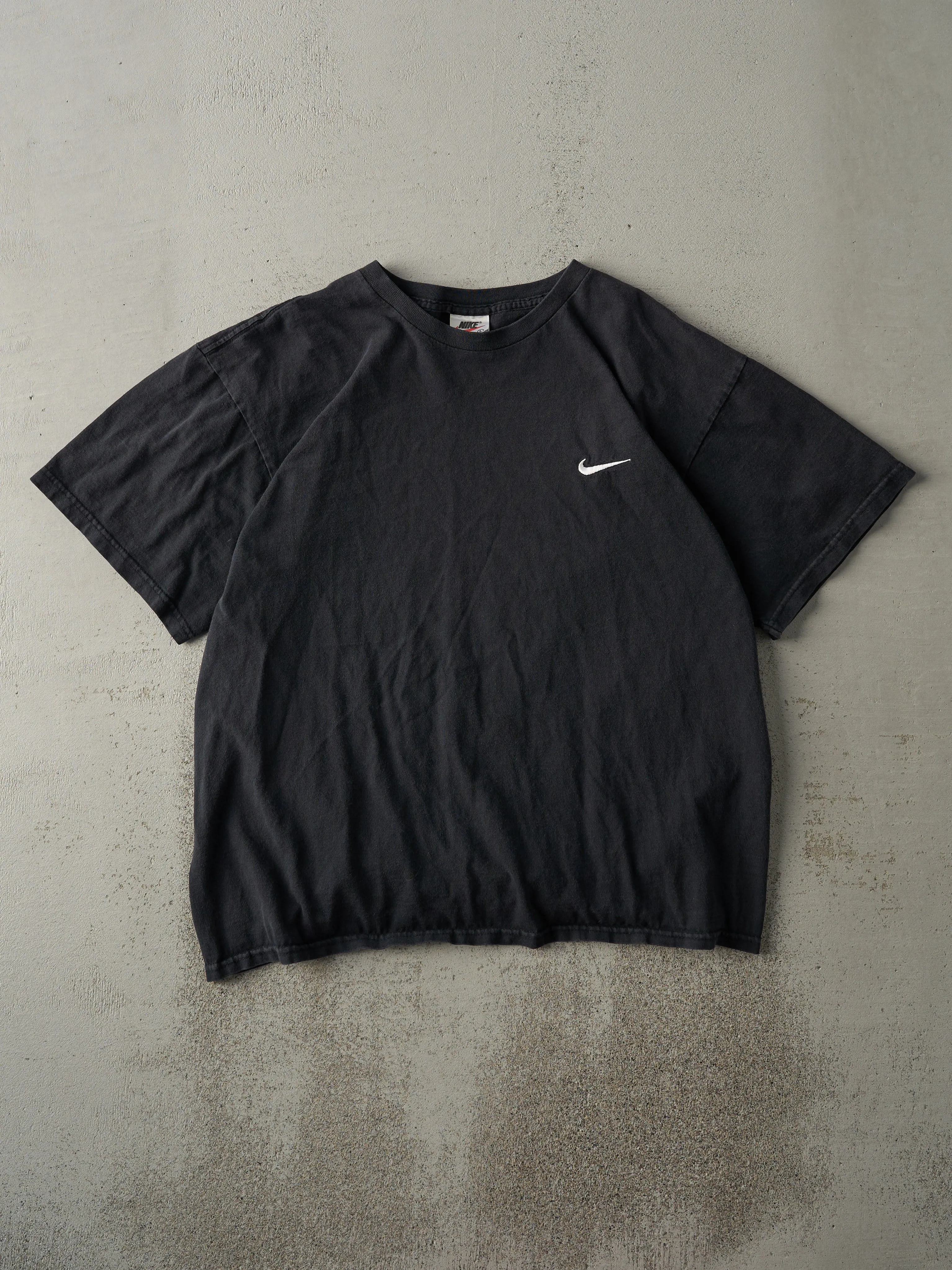 Vintage 90s Black Embroidered Nike Swoosh Tee (L) sold by Rebalance Vintage