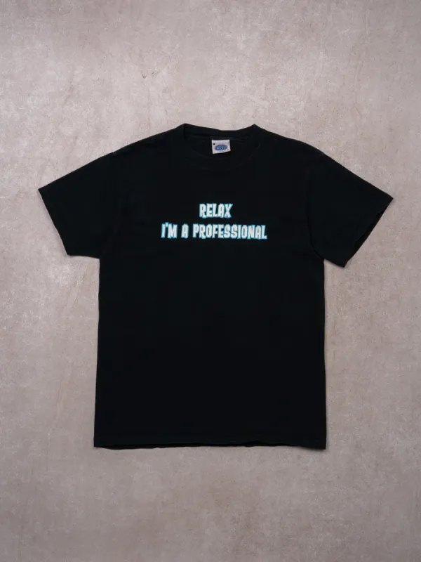 VIntage 90s Black 'Relax Im Professional' Tee (S) sold by Rebalance Vintage