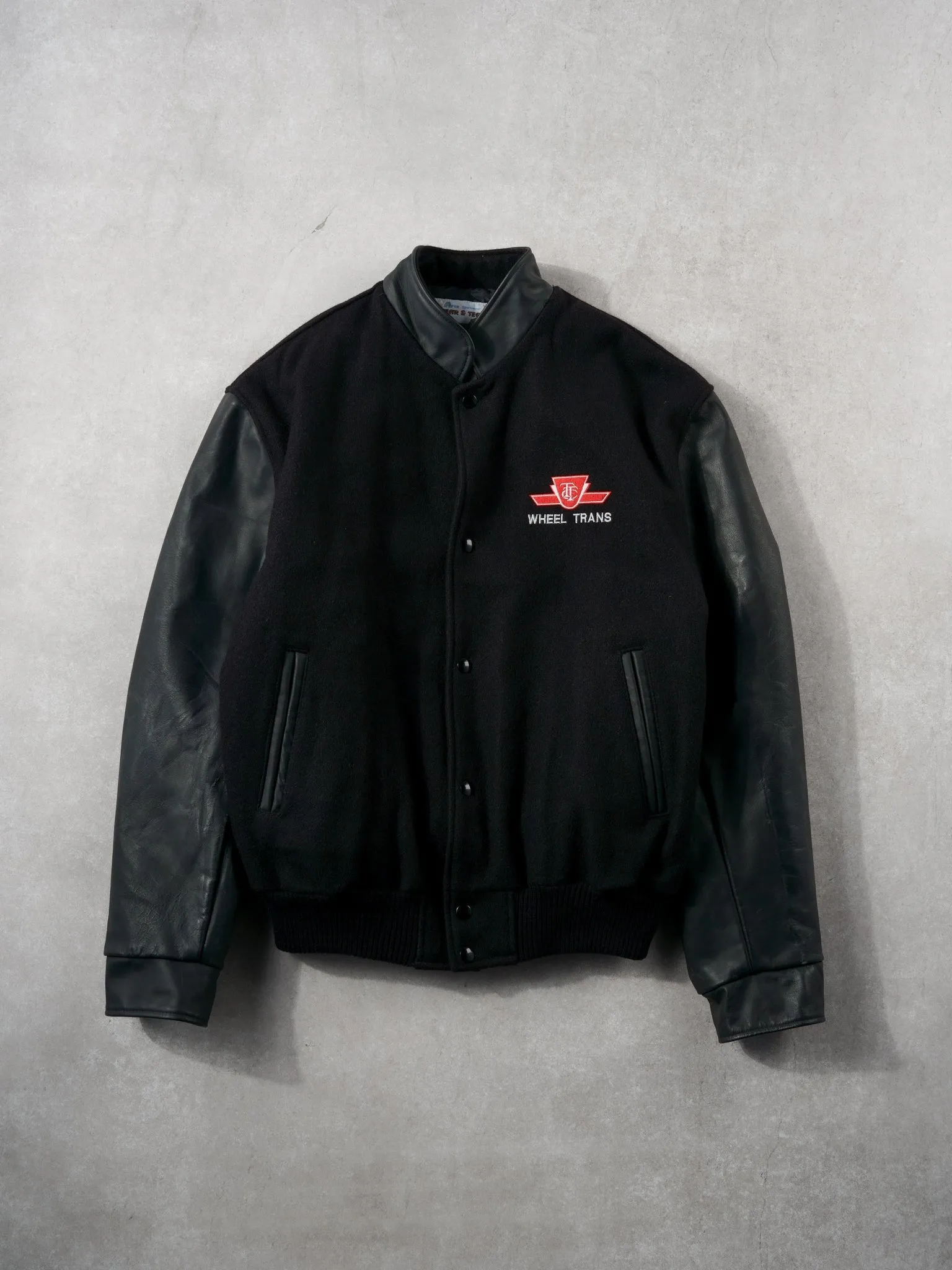 Black TTC Wheel Trans Ride The Rocket Bomber Jacket (L) sold by Rebalance Vintage