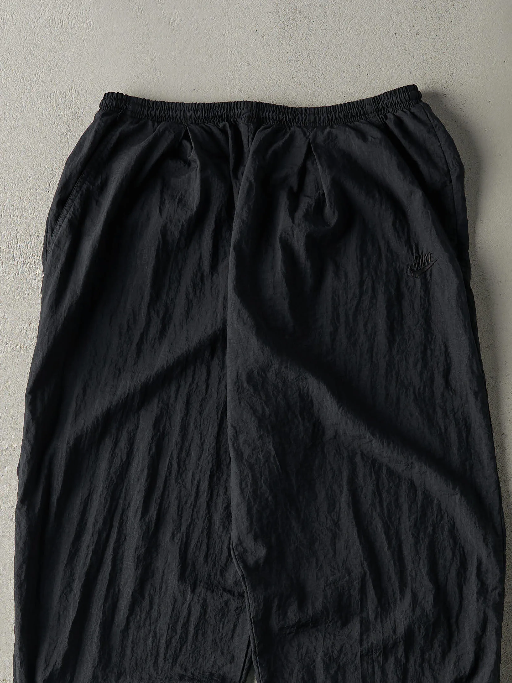 Vintage 90s Black Nike Embroidered Windbreaker Pants (30x32) sold by Rebalance Vintage product image thumbnail 3