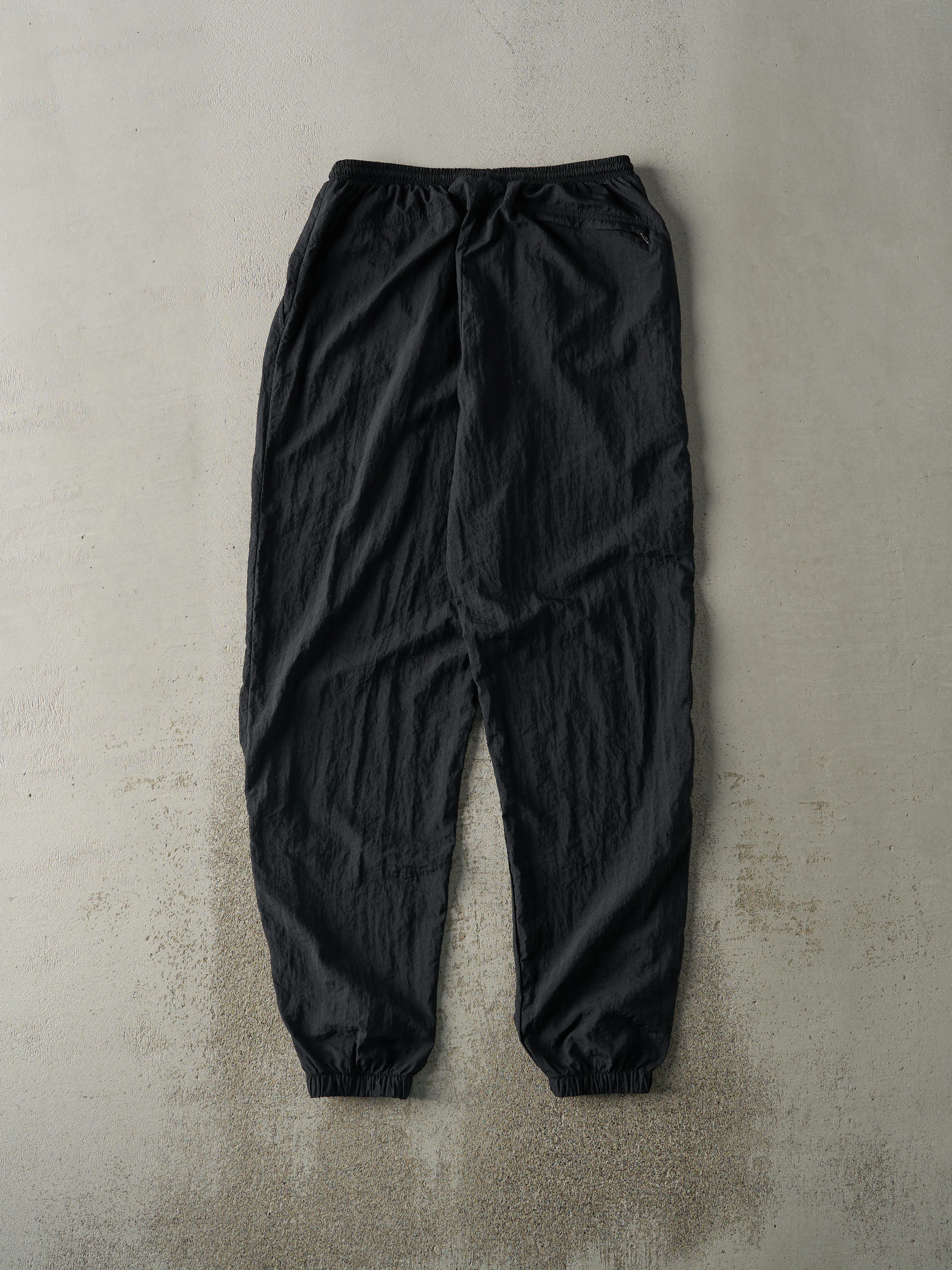 Vintage 90s Black Nike Embroidered Windbreaker Pants (30x32) sold by Rebalance Vintage product image thumbnail 2
