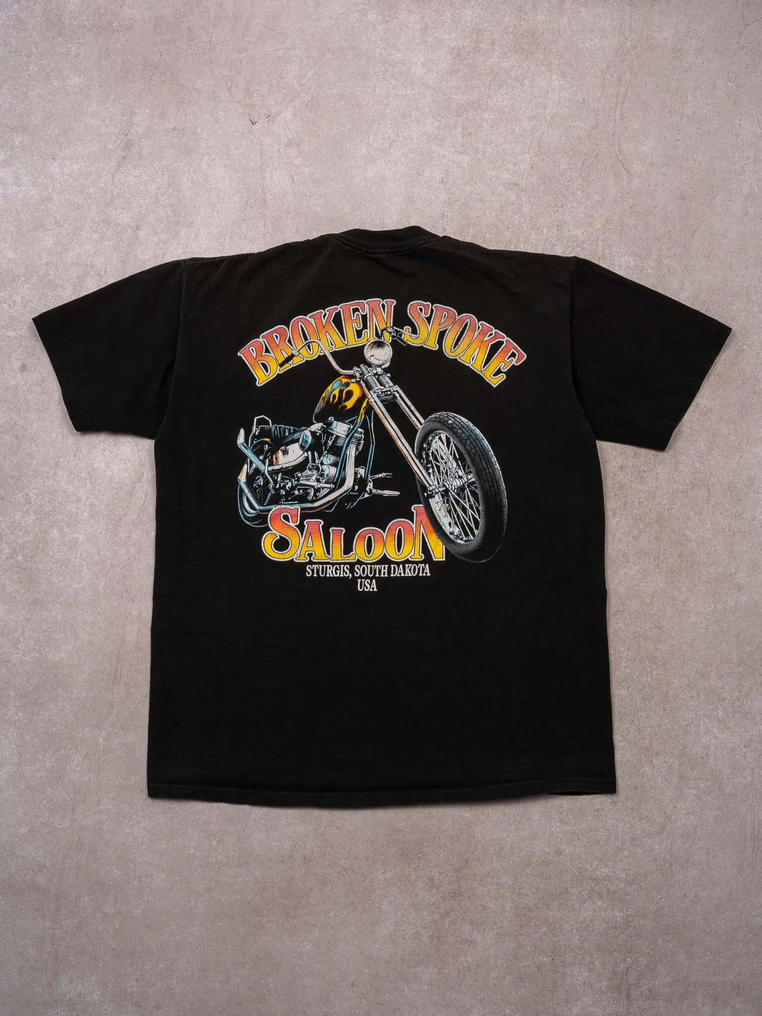Vintage 90s Black Broken Spoke Saloon Sturgis South Dakota Tee (M) sold by Rebalance Vintage