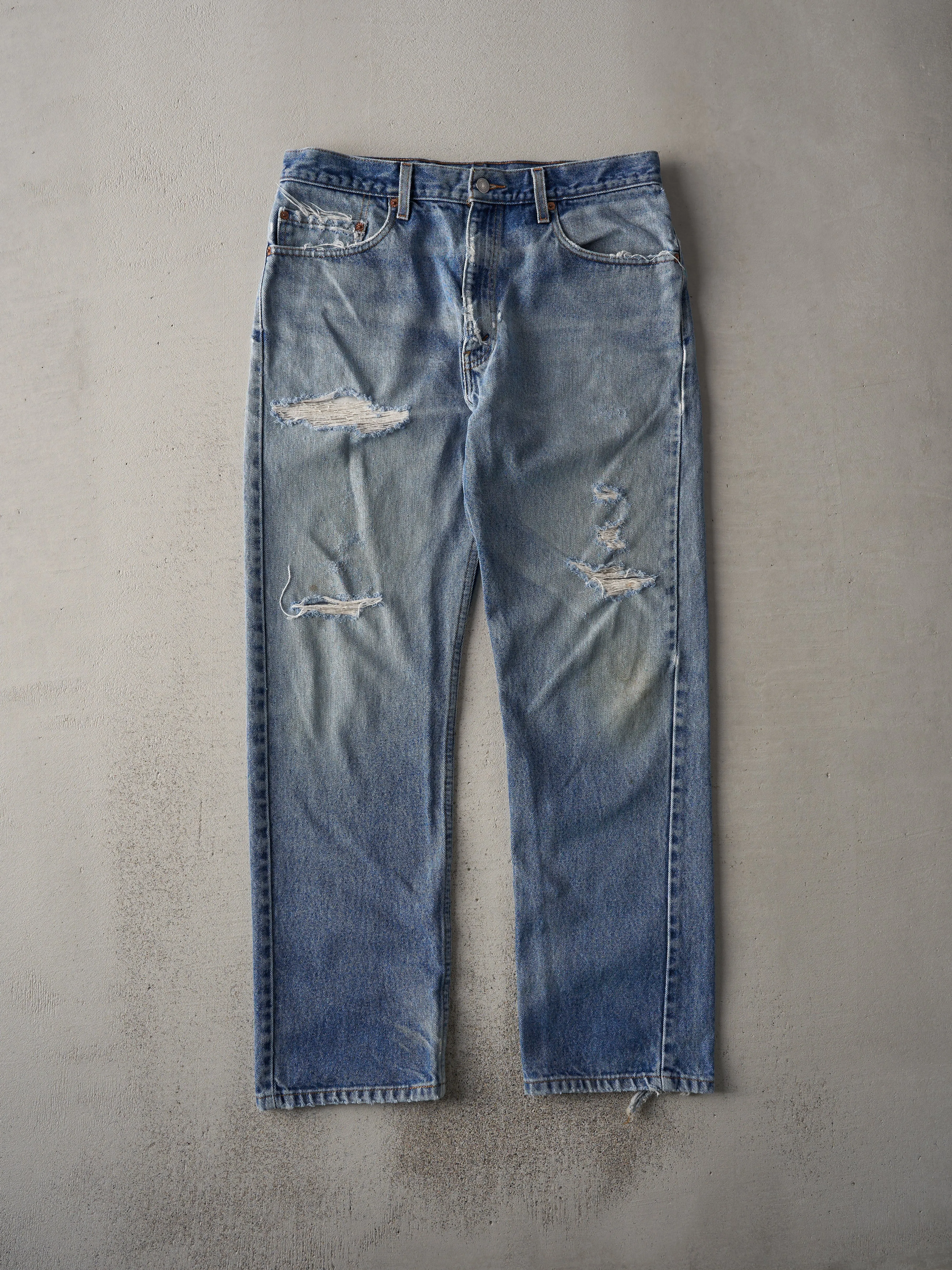 Vintage 90s Mid Wash Distressed Levi's 505 Jeans (34x29) sold by Rebalance Vintage