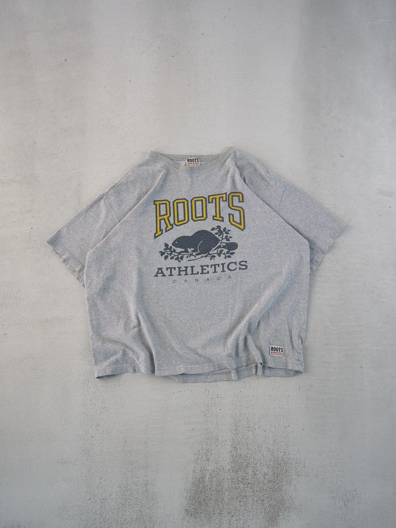 Vintage Grey Roots Athletics Graphic Boxy Tee (L) sold by Rebalance Vintage