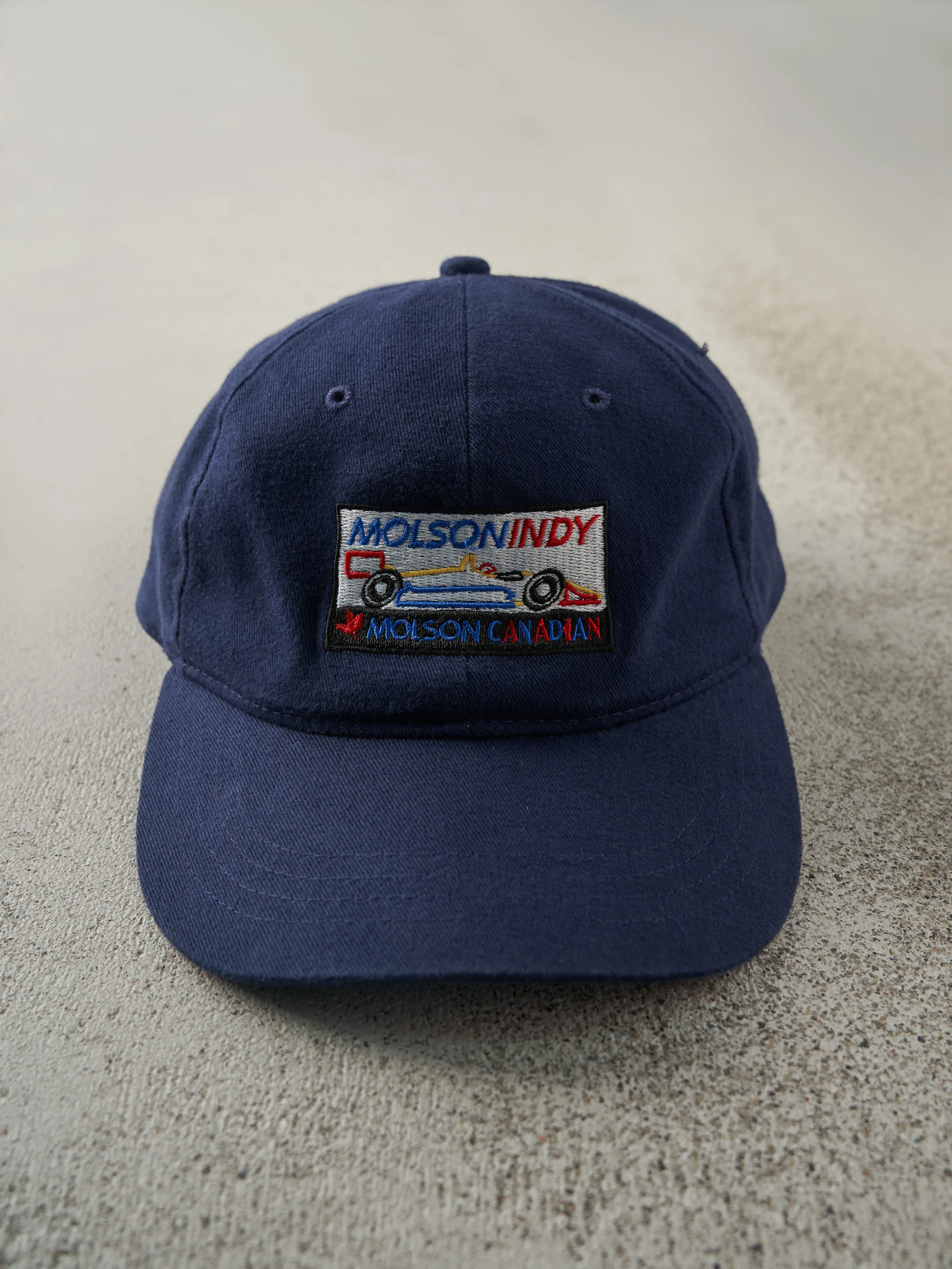 Vintage Y2K Navy Blue Molson Indy Racing Embroidered Strap Back sold by Rebalance Vintage