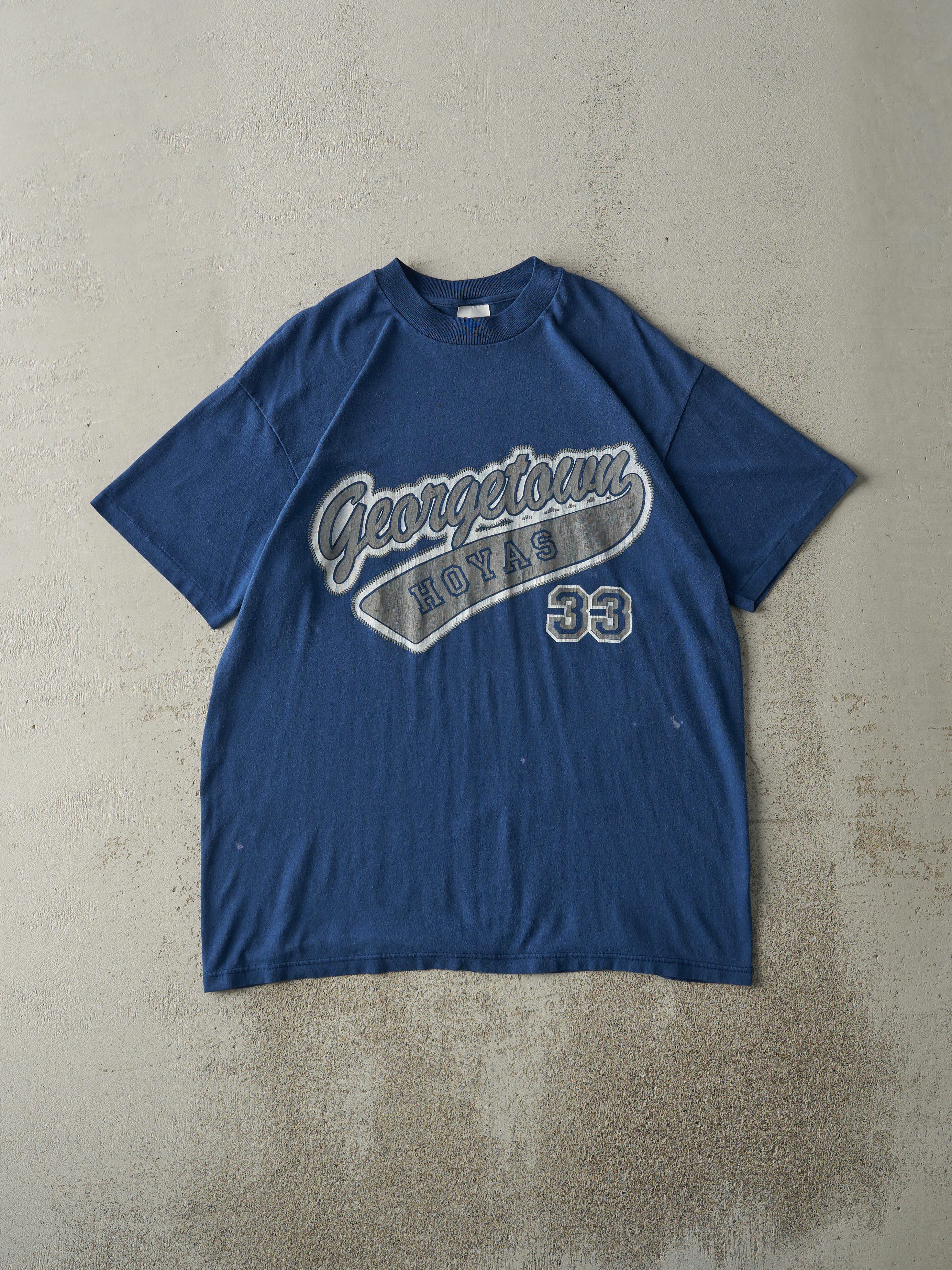 Vintage 90s Blue Georgetown University Hoyas Single Stitch Tee (M/L) sold by Rebalance Vintage