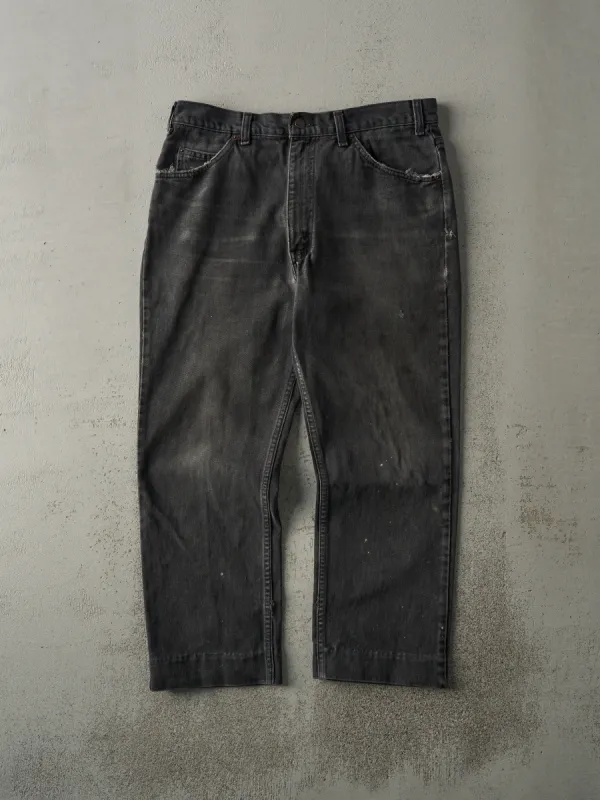 Vintage 90s Faded Black Levi's Orange Tab Denim Pants (34x25.5) sold by Rebalance Vintage