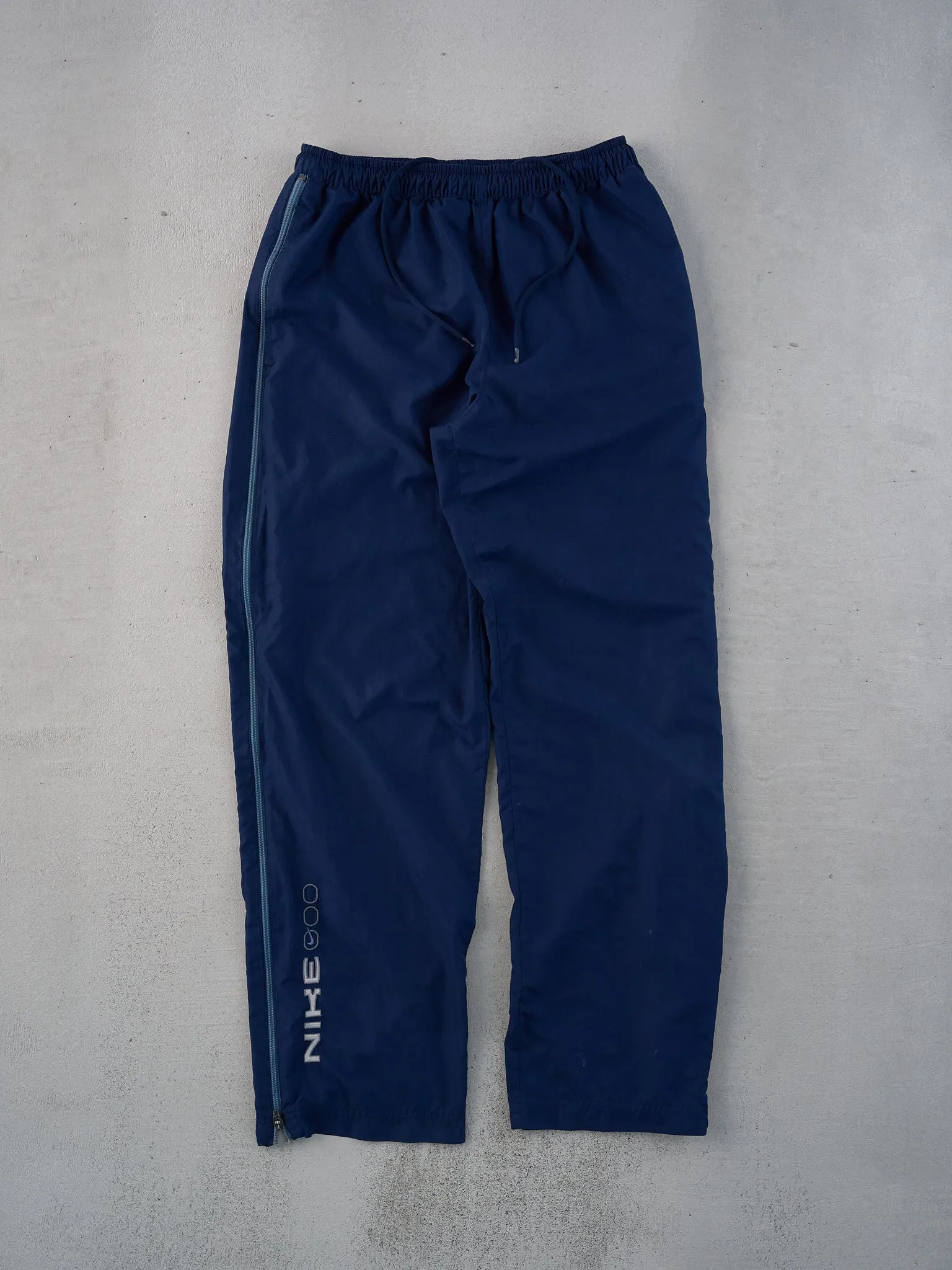 Vintage Y2k Navy Blue Nike Zip up Track Pants (30x33) sold by Rebalance Vintage