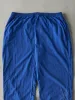 Vintage 90s Blue Champion Embroidered Logo Nylon Windbreaker Pants (36x32.5) sold by Rebalance Vintage