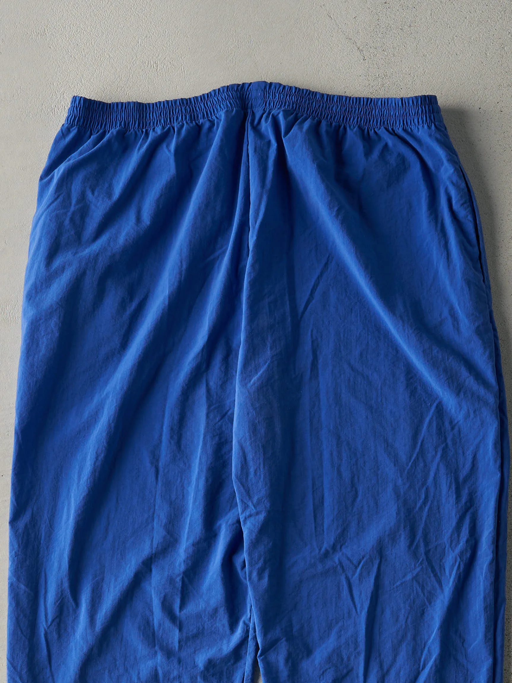 Vintage 90s Blue Champion Embroidered Logo Nylon Windbreaker Pants (36x32.5) sold by Rebalance Vintage product image thumbnail 4