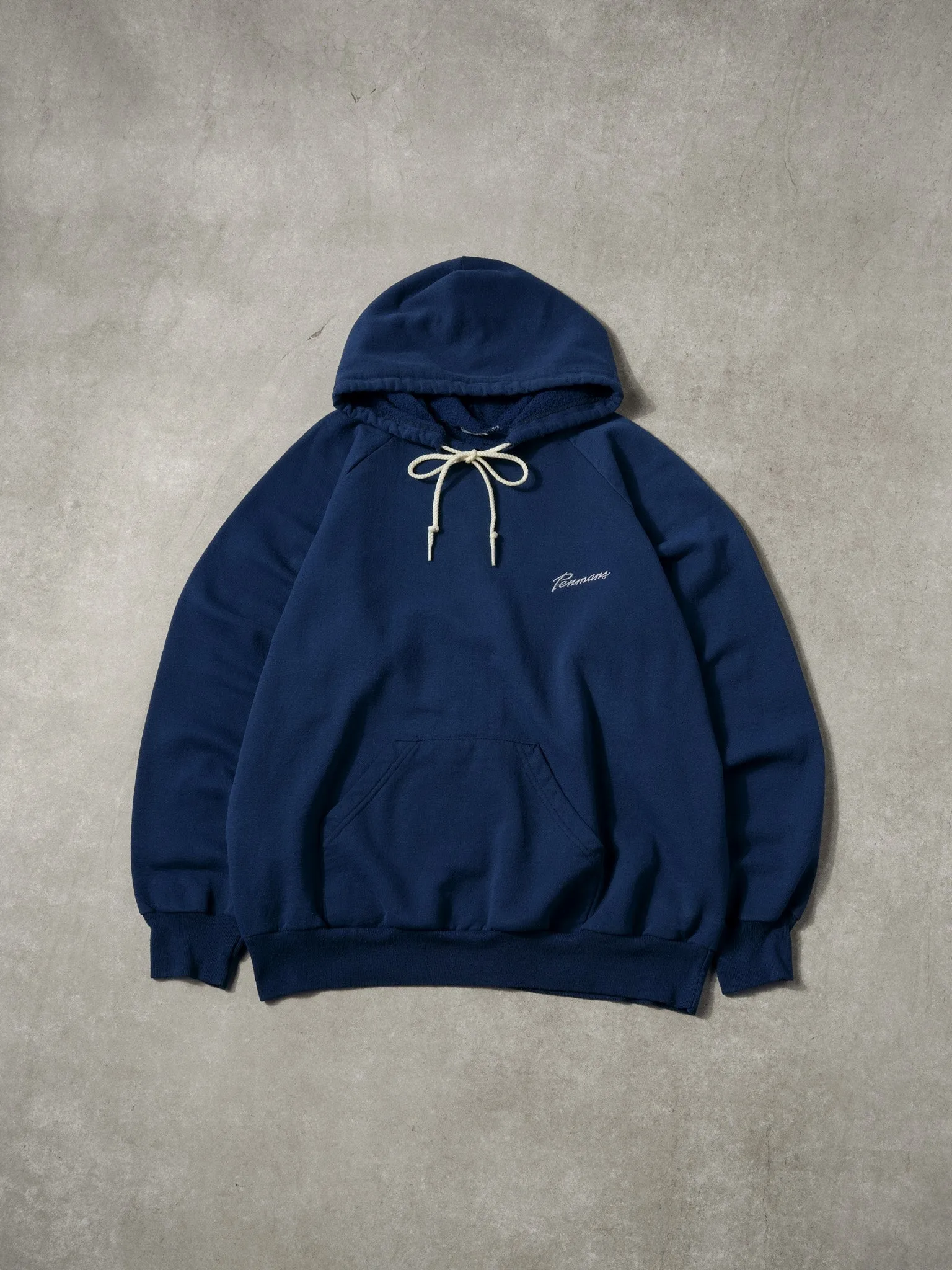 Vintage 80s Navy Blue Pennans Hoodie (L) sold by Rebalance Vintage