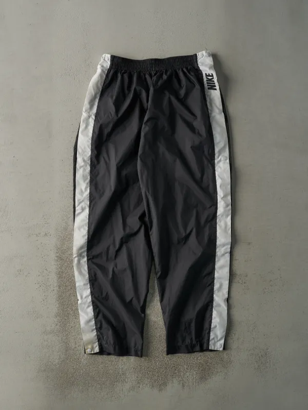 Vintage 90s Black Nike Tear Away Track Pants (32x33.5) sold by Rebalance Vintage
