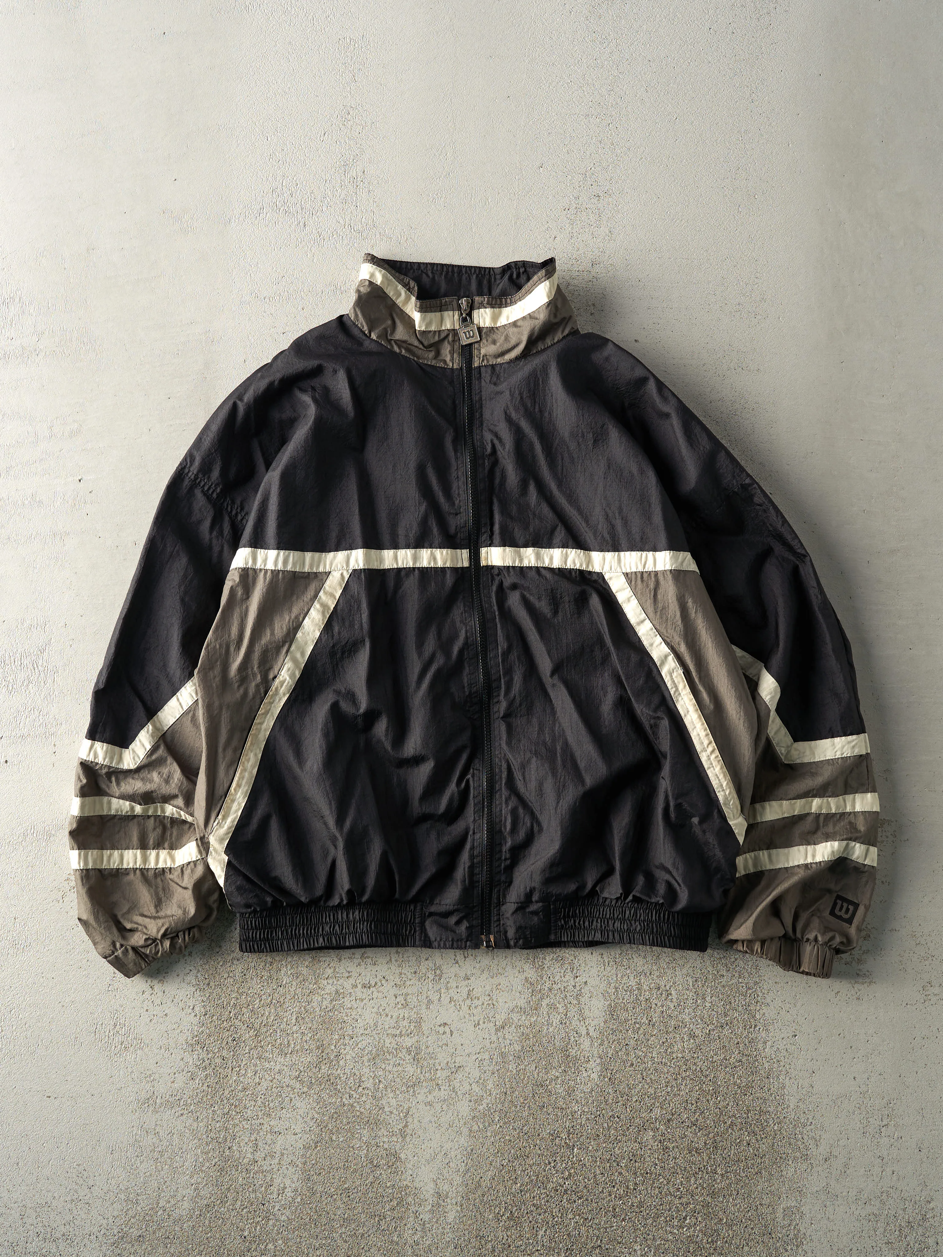 Vintage 90s Wilson Windbreaker Jacket (L) sold by Rebalance Vintage