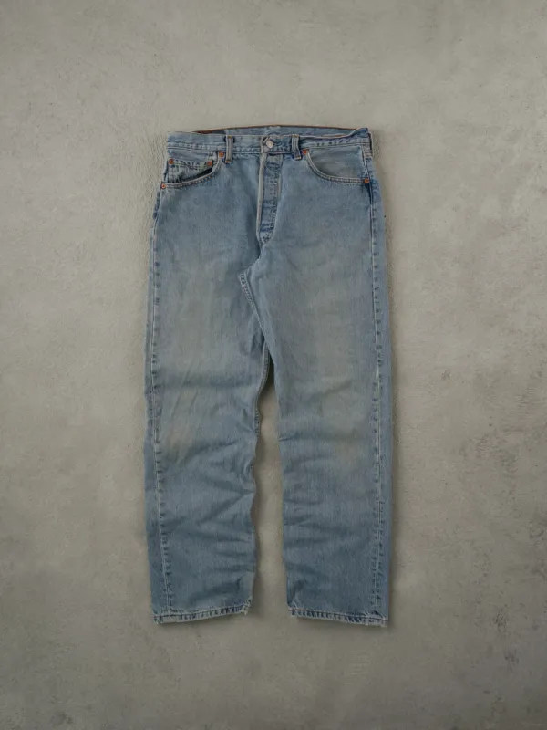 Vintage 90s Light Washed Blue Levi's 501 Denim Jeans (34x30) sold by Rebalance Vintage
