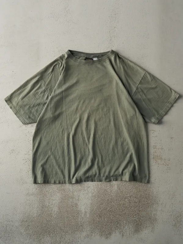 Vintage 90s Sun Faded Green Blank Tee (L/XL) sold by Rebalance Vintage