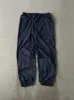 Vintage 90s Navy Blue Embroidered Champion Track Pants (33x30.5) sold by Rebalance Vintage
