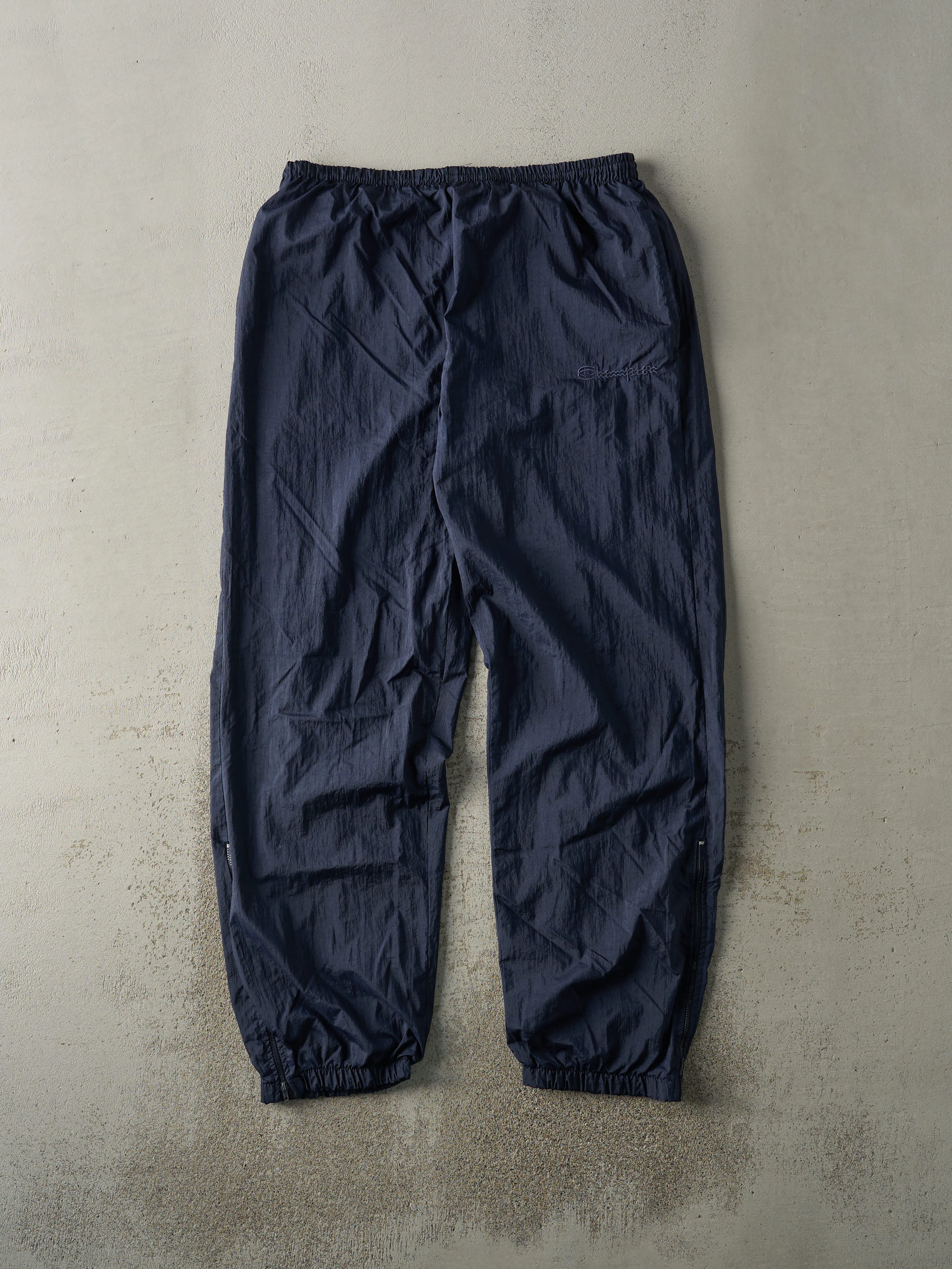 Vintage 90s Navy Blue Embroidered Champion Track Pants (33x30.5) sold by Rebalance Vintage