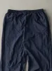 Vintage 90s Navy Blue Embroidered Champion Track Pants (33x30.5) sold by Rebalance Vintage