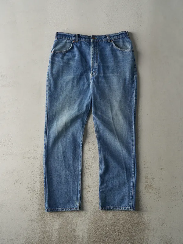 Vintage 80s Mid Wash Levi's Orange Tab 619 Jeans (35.5x30) sold by Rebalance Vintage