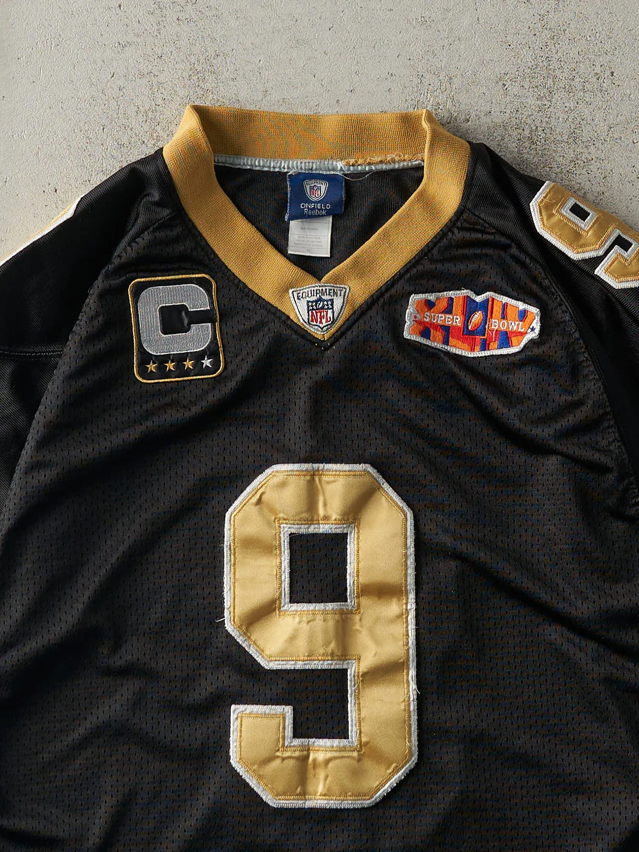 Vintage Y2K Black New Orleans Saints #9 Drew Brees Cropped Football Jersey (M/L) sold by Rebalance Vintage product image thumbnail 4