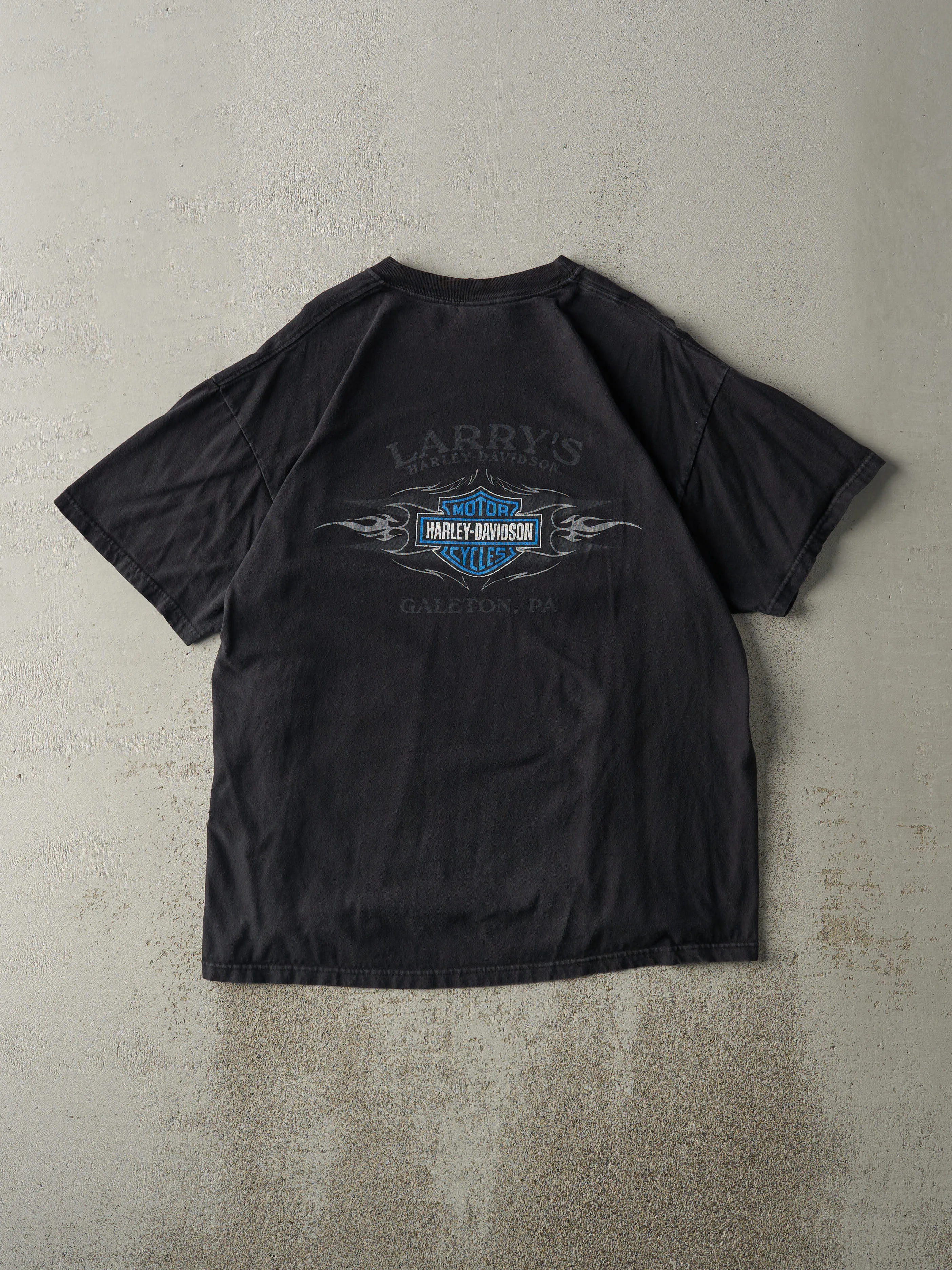 Vintage 06' Black Galeton, PA Harley Davidson Tee (L) sold by Rebalance Vintage