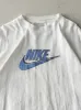 Vintage Y2K White Nike Logo Tee (M) sold by Rebalance Vintage