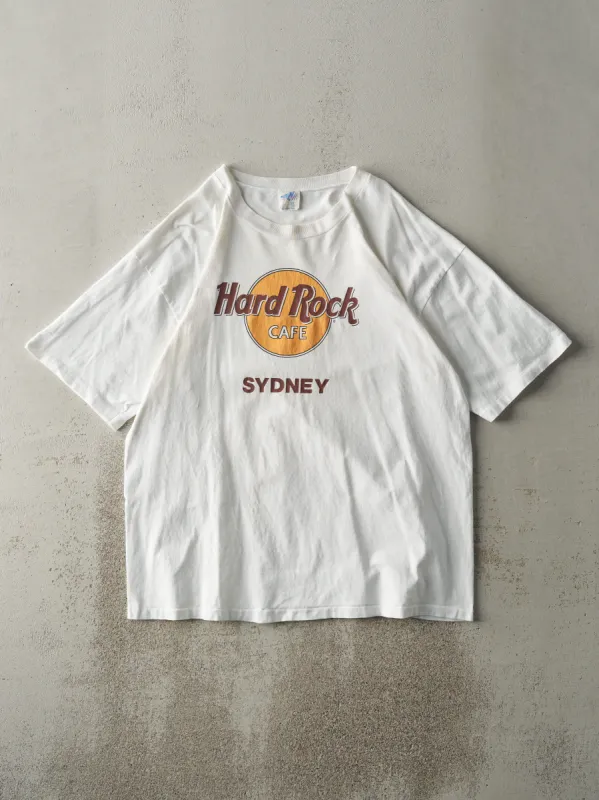 Vintage 90s White Hard Rock Cafe Sydney Tee (L) sold by Rebalance Vintage