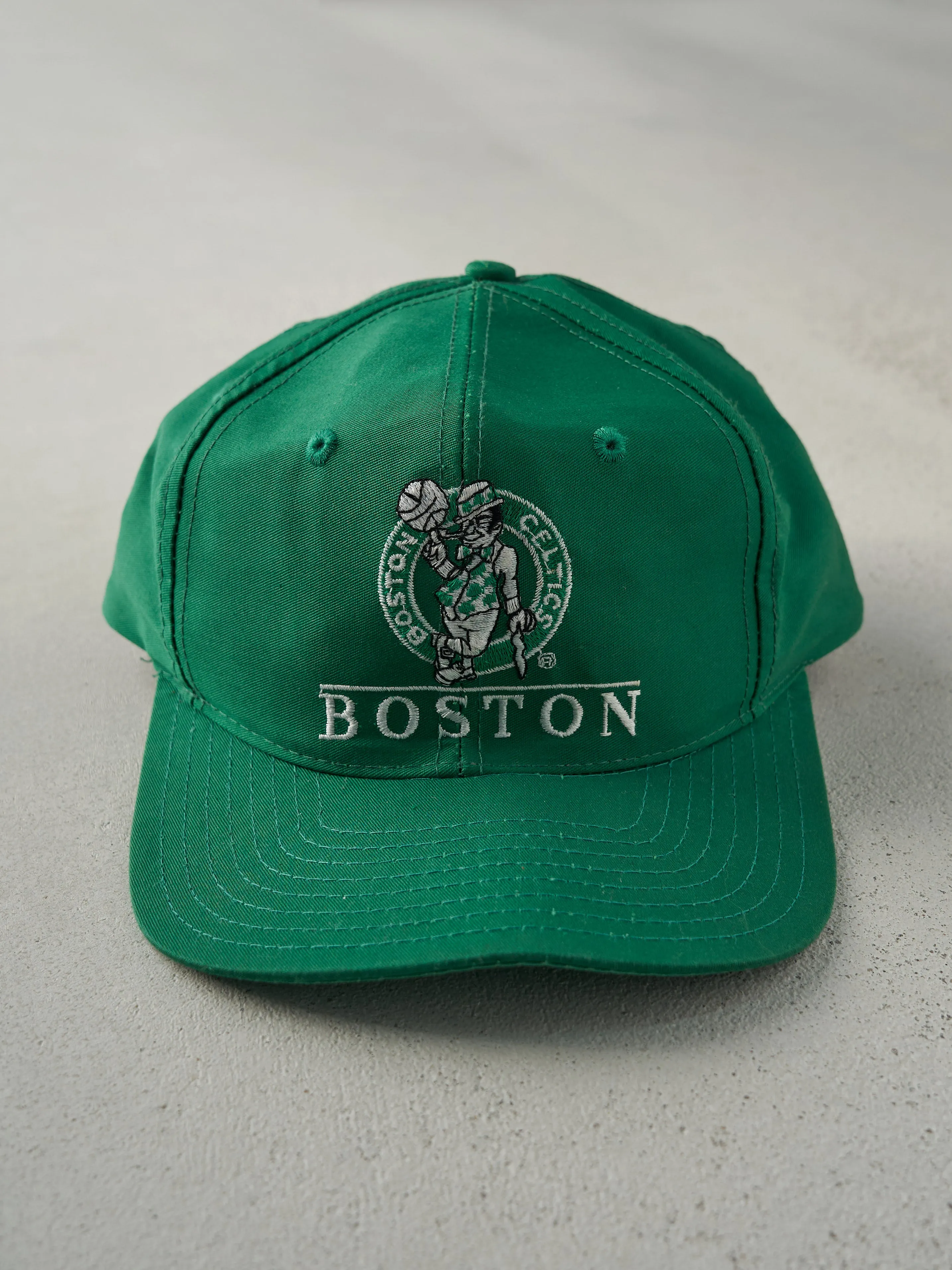 Vintage 90s Green Boston Celtics Embroidered Snap Back Hat sold by Rebalance Vintage