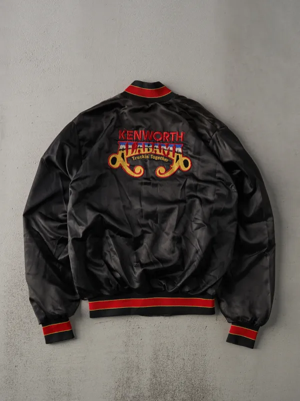 Vintage 90s Black Kenworth Alabama Trucking Together Satin Bomber (L) sold by Rebalance Vintage