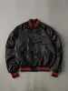 Vintage 90s Black Kenworth Alabama Trucking Together Satin Bomber (L) sold by Rebalance Vintage