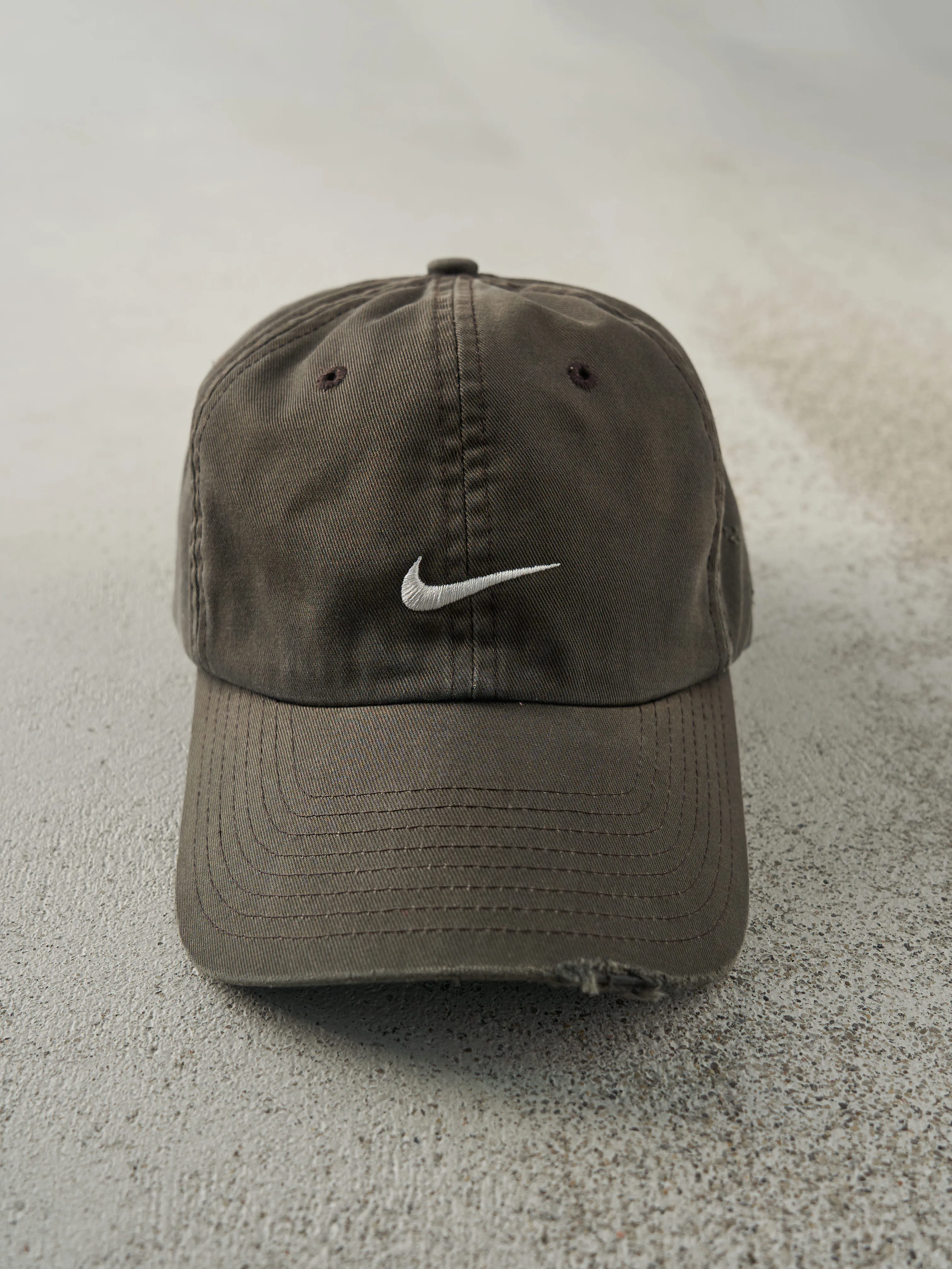 Vintage 90s Faded Black Embroidered Nike Swoosh Strap Back Hat sold by Rebalance Vintage