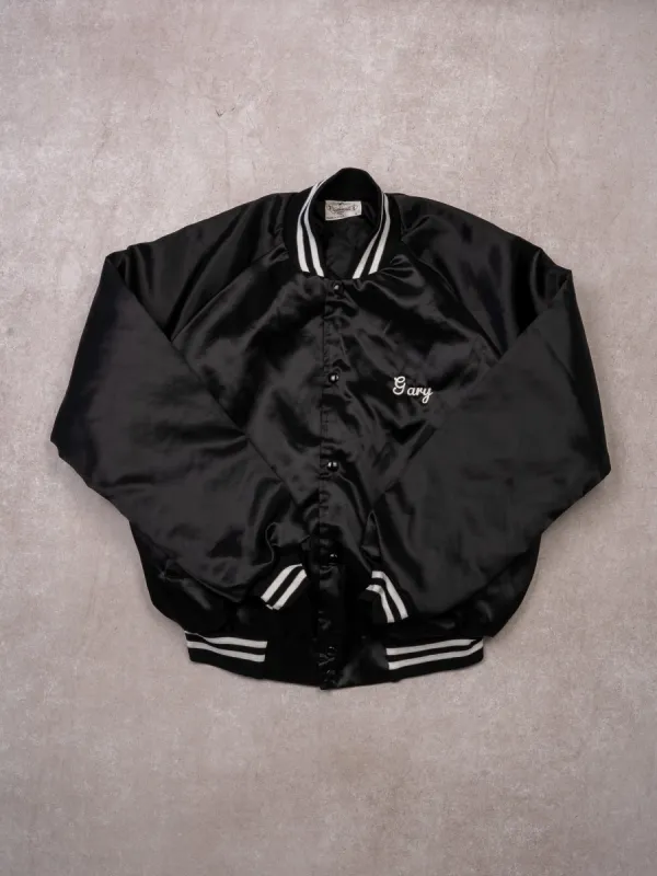 Vintage 80s Black Northeastern Builders Satin Bomber (L) sold by Rebalance Vintage