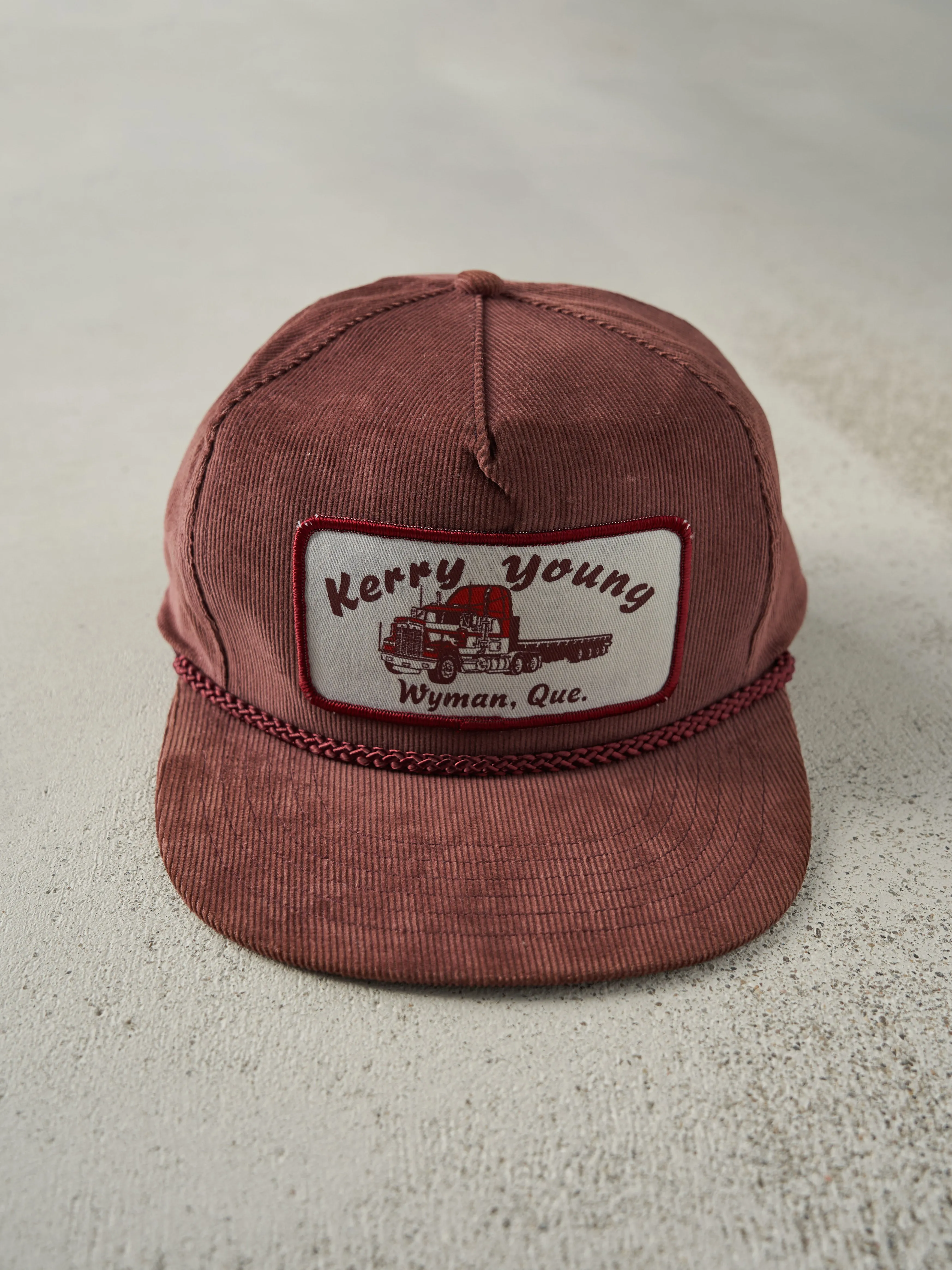 Vintage 80s Burgundy Kerry Young Trucking Corduroy Snapback Hat sold by Rebalance Vintage