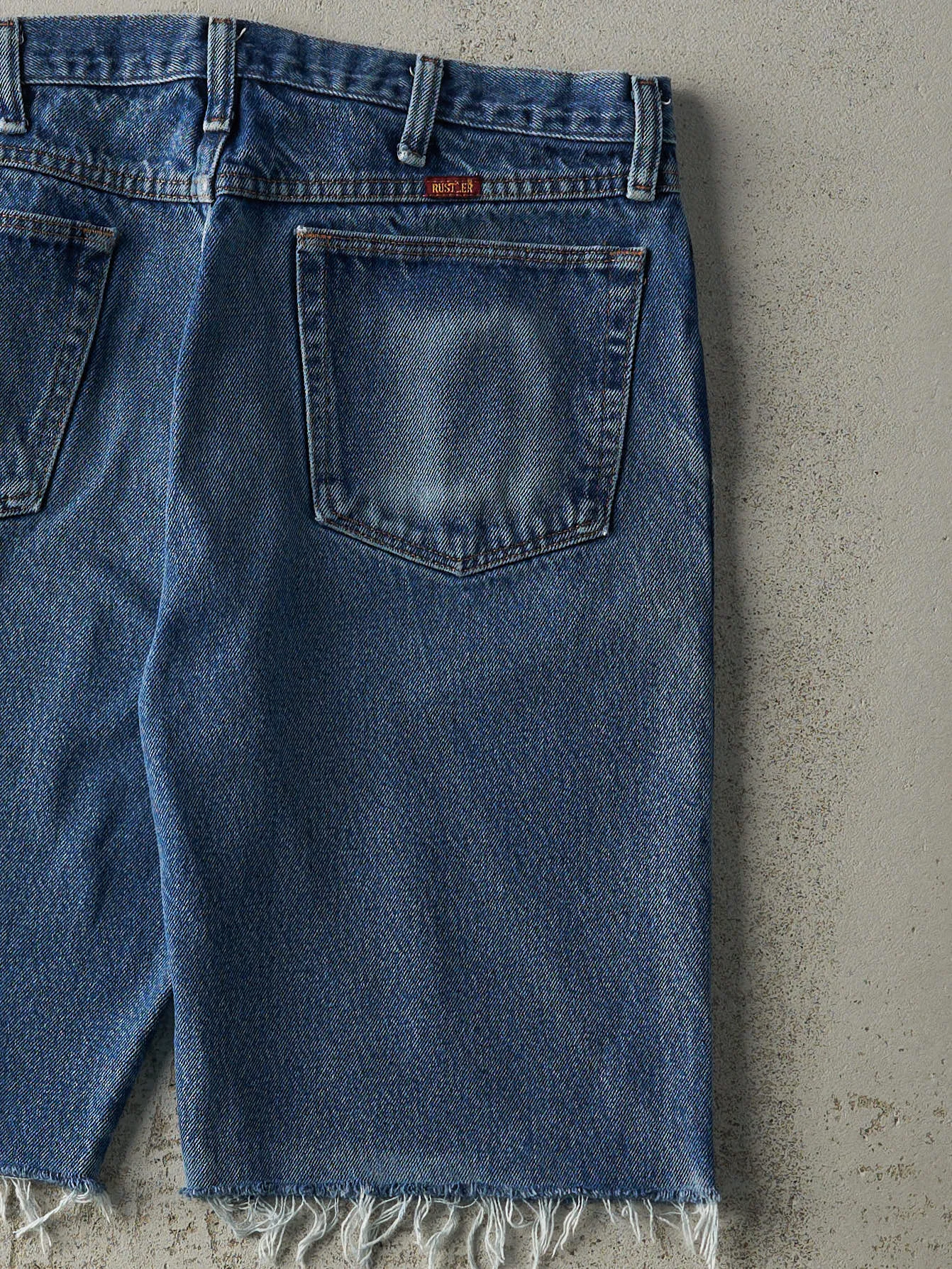Vintage Y2K Mid Wash Rustler Cut Off Jean Shorts (35x10.5) sold by Rebalance Vintage product image thumbnail 5