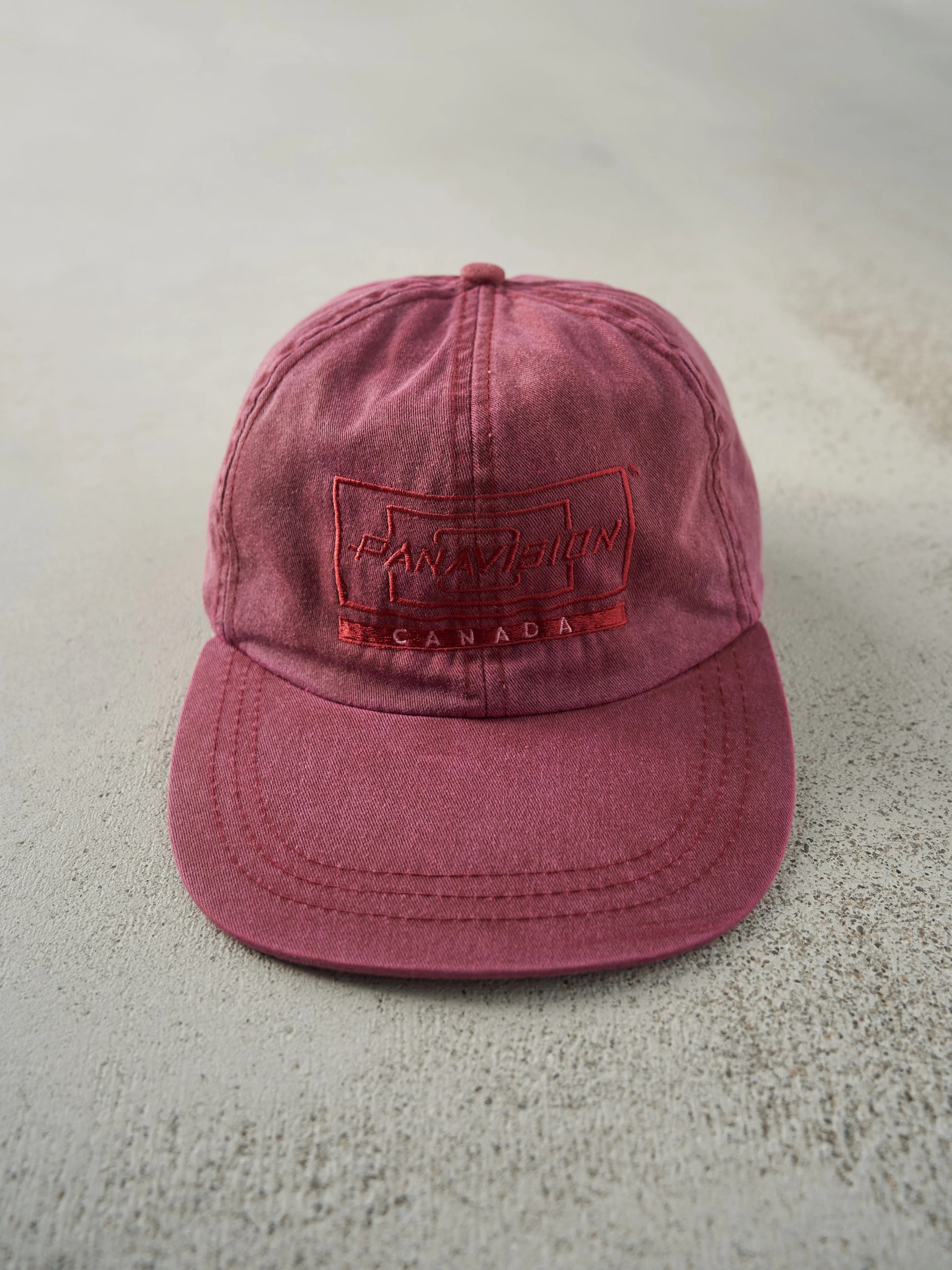 Vintage 97' Red Embroidered Panavision Canada Leather Strap Back Hat sold by Rebalance Vintage