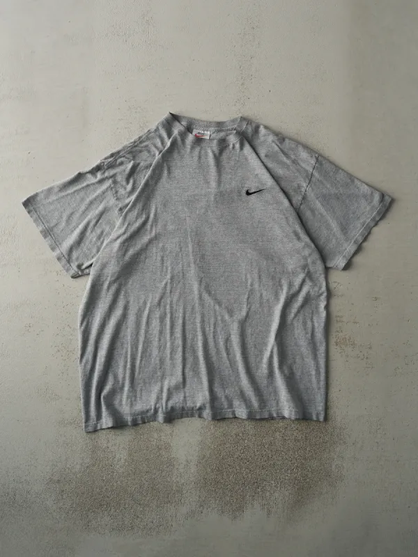 Vintage 90s Grey Embroidered Nike Swoosh Tee (L) sold by Rebalance Vintage