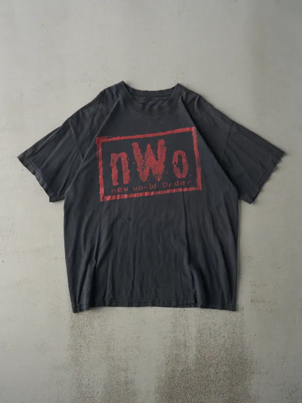 Vintage 98' Faded Black WCW N.W.O Wrestling Tee (L) sold by Rebalance Vintage