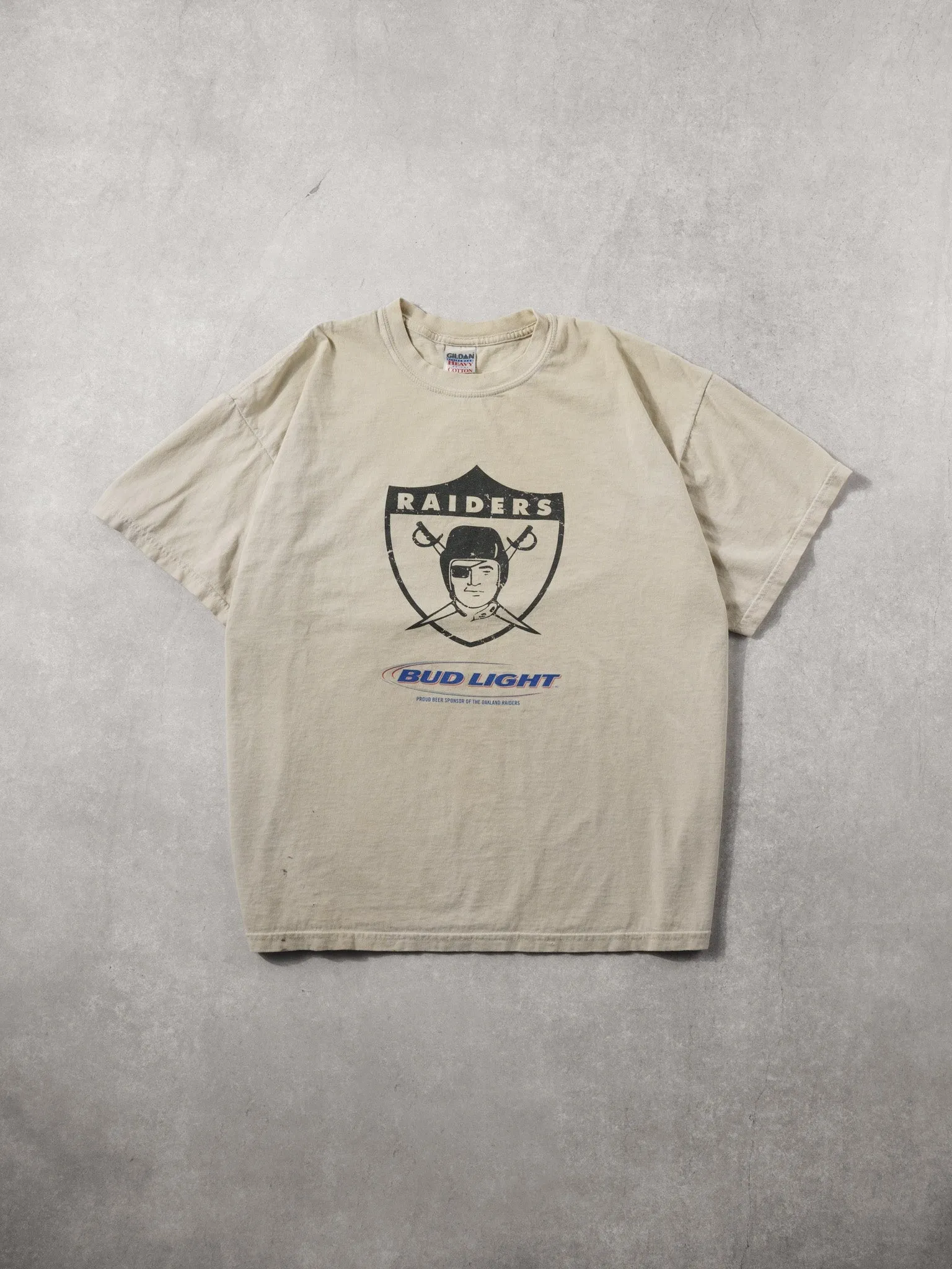 Vintage 90s Biege Las Legas Raiders X Bud Light Tee (L) sold by Rebalance Vintage