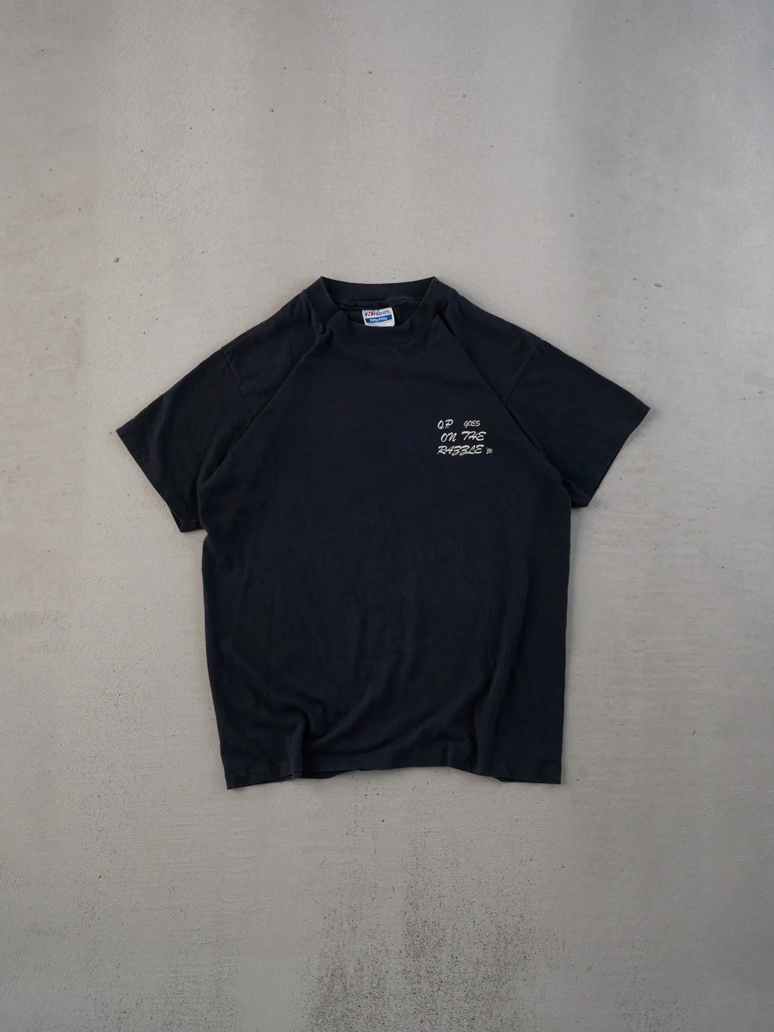 Vintage 86' Black Single Stitched QP Goes On The Rabble Tee (S) sold by Rebalance Vintage