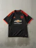 Vintage Y2K Black & Orange Manchester United Soccer Jersey (M/L) sold by Rebalance Vintage