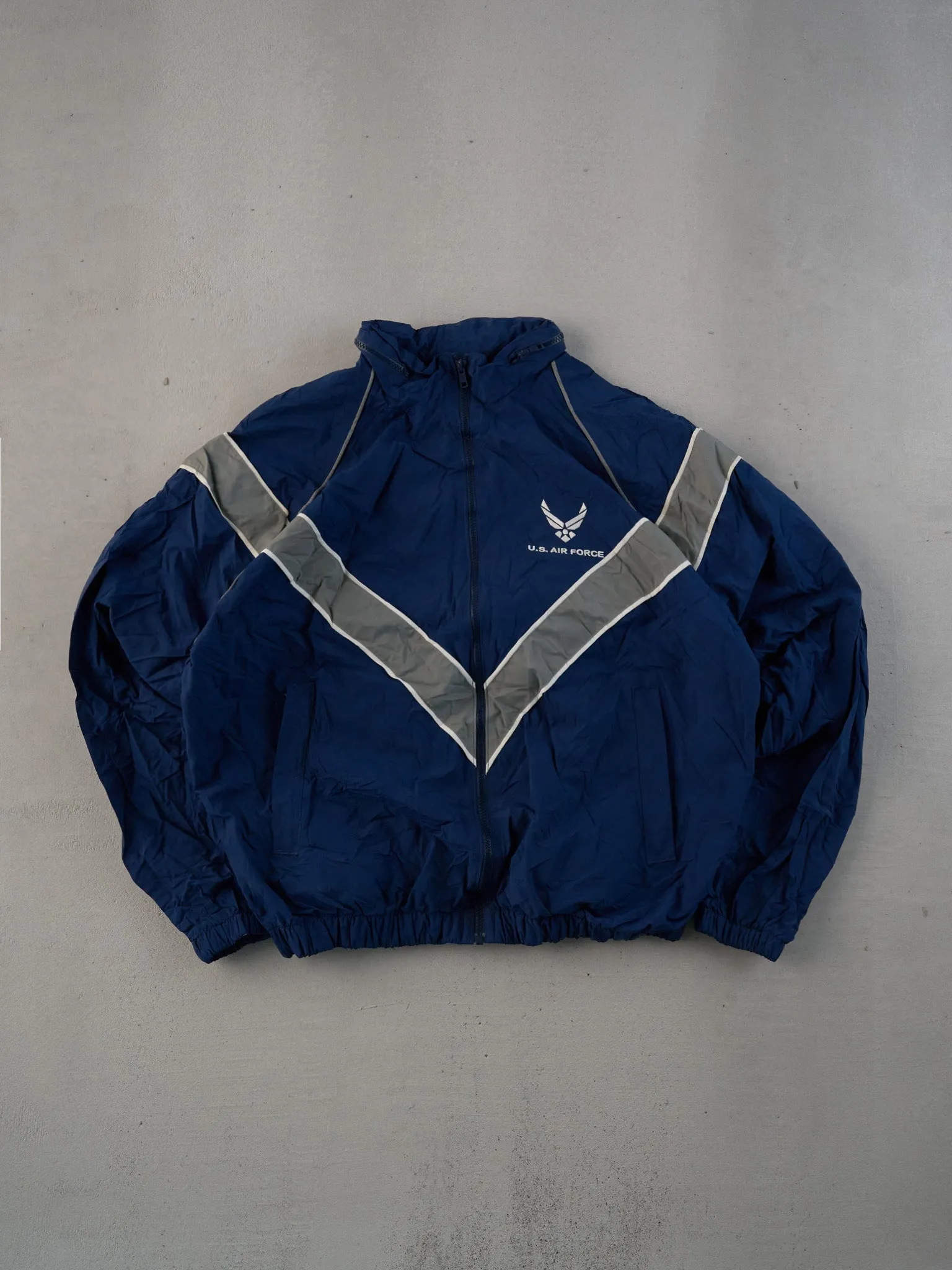 Vintage Navy Blue US Air Force Windbreaker (L) sold by Rebalance Vintage