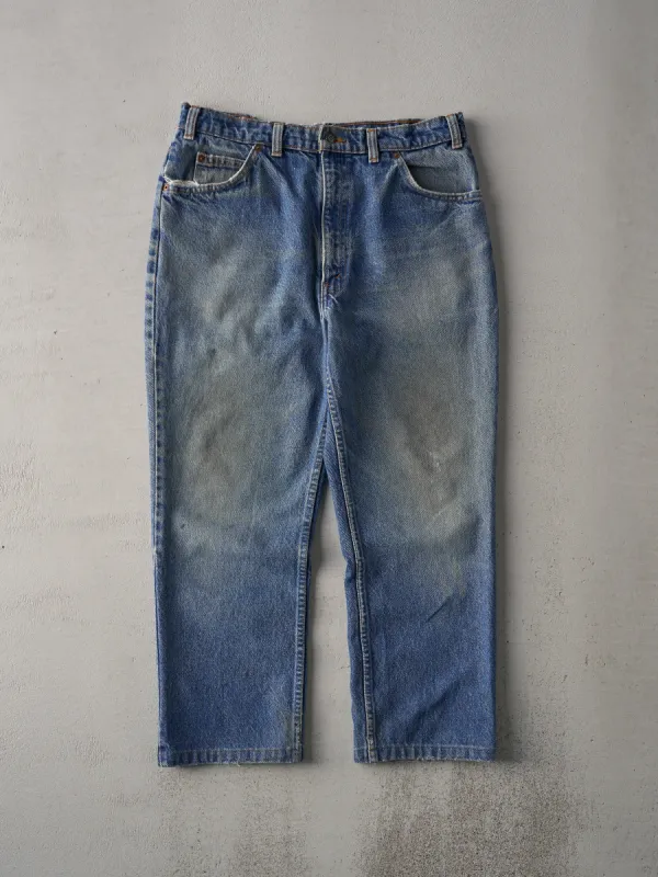 Vintage 90s Mid Wash Levi's 619 Orange Tab Denim Jeans (32x25) sold by Rebalance Vintage